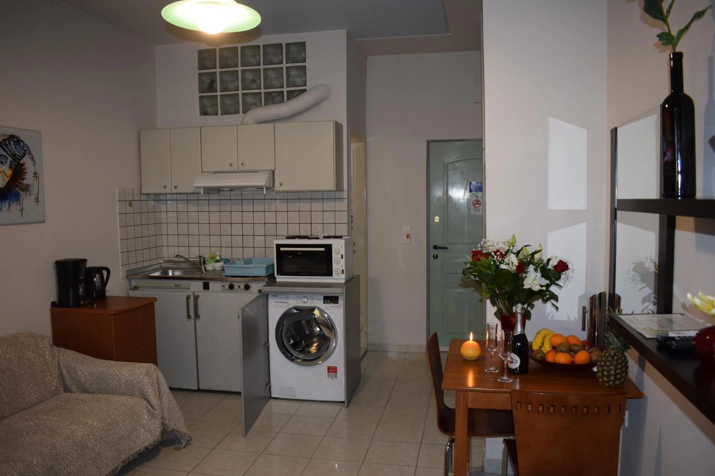 Kitchen or kitchenette in Alena Apartments