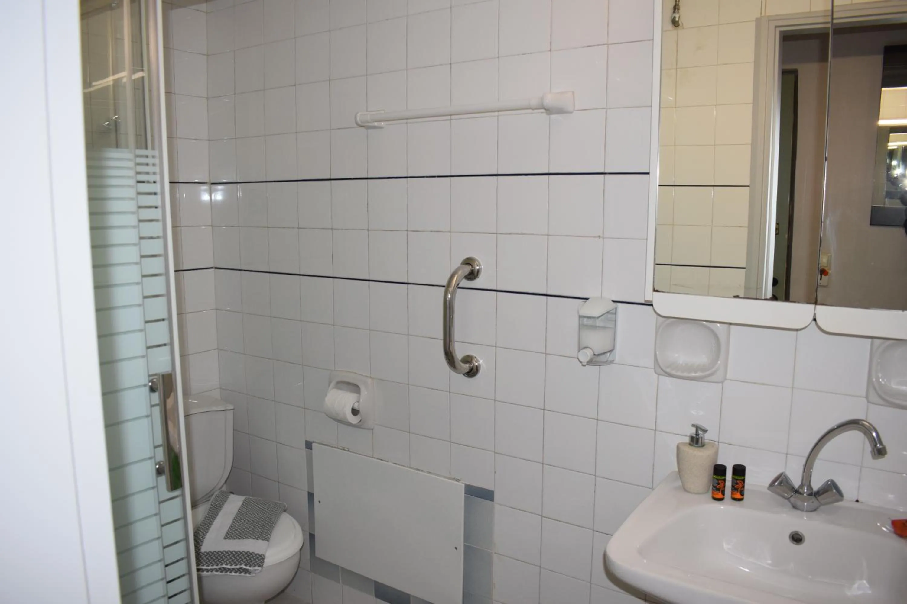 Bathroom in Alena Apartments