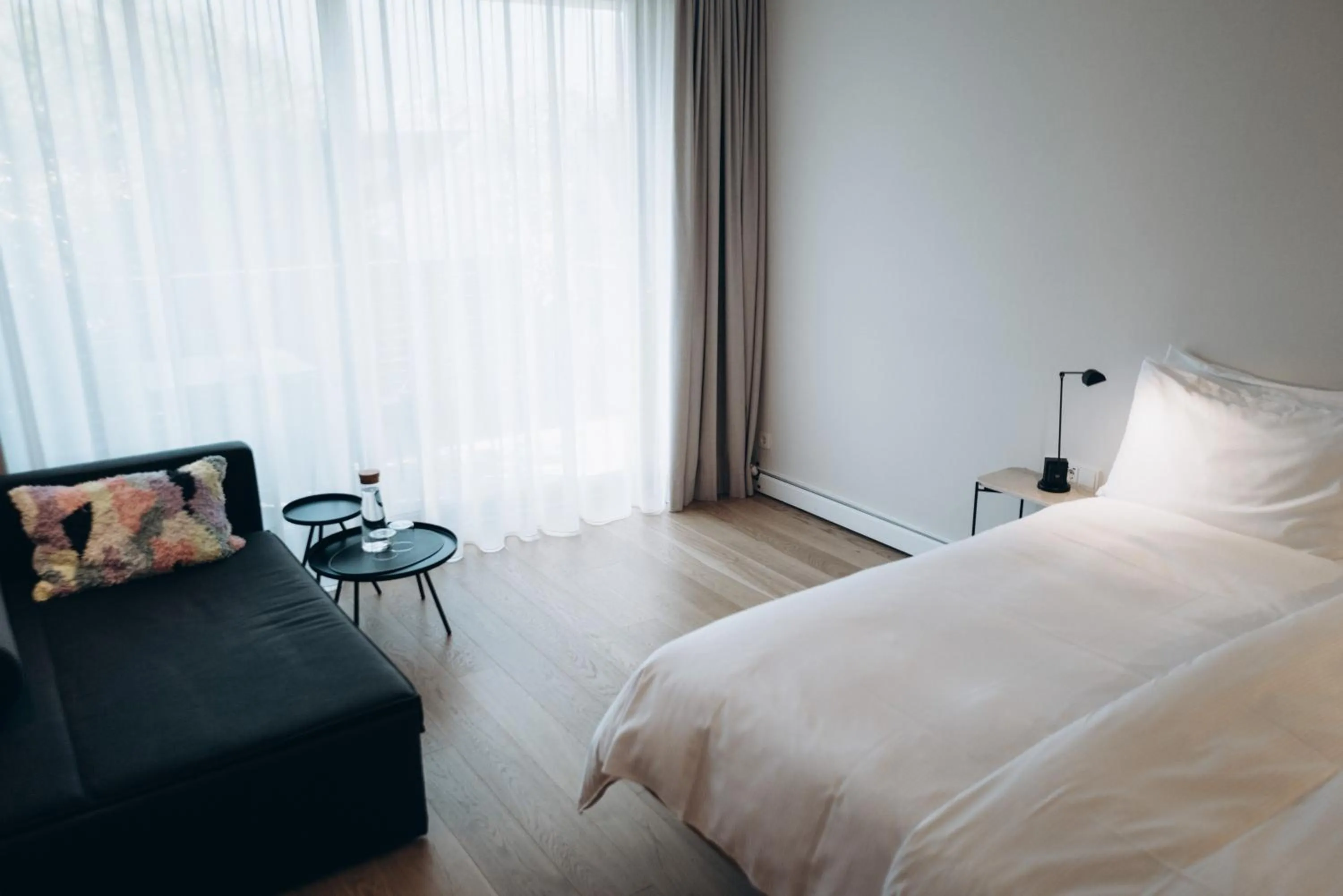 Seating area, Bed in Design Hotel Tyrol