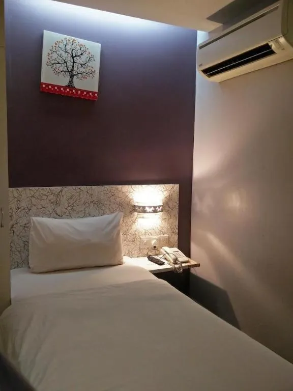 Bed in BLUEMOON BOUTIQUE HOTEL