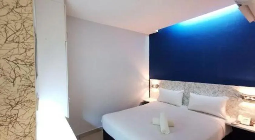 Bed in BLUEMOON BOUTIQUE HOTEL