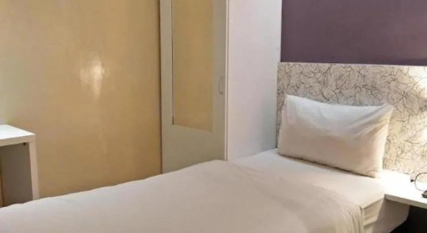 Bed in BLUEMOON BOUTIQUE HOTEL