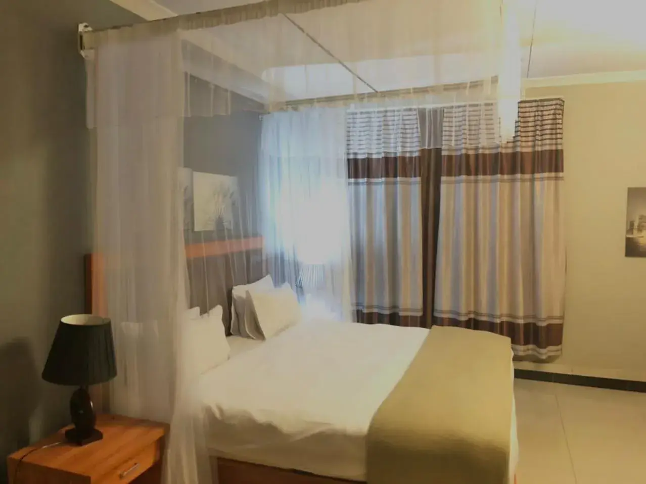 Deluxe Double Room with Balcony - single occupancy in Top Lodge in Blantyre Deluxe Double Room with Balcony - single occupancy in Top Lodge in Blantyre