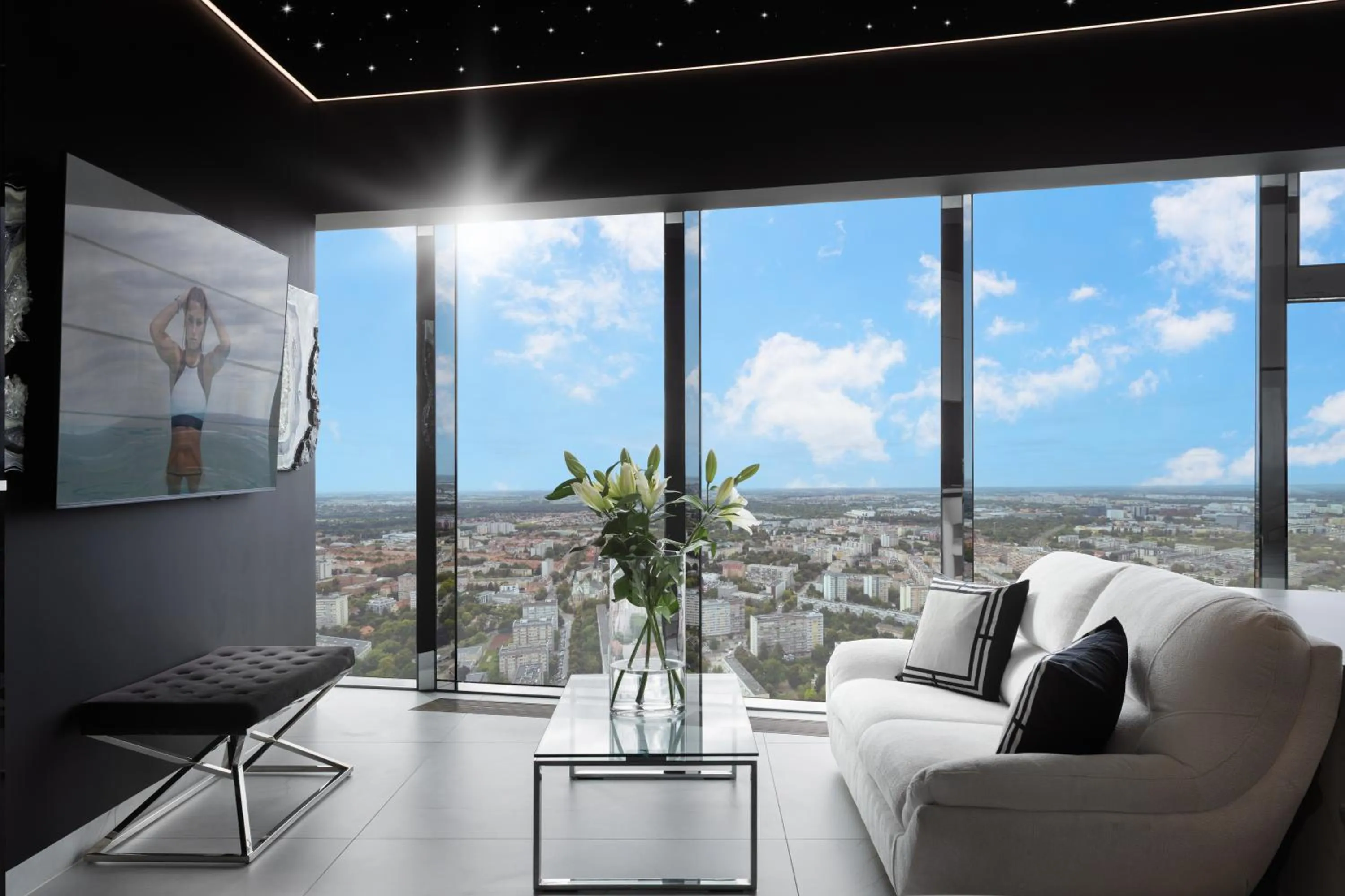 TV and multimedia in Apartamenty Sky Tower z Jakuzzi Przy Oknie