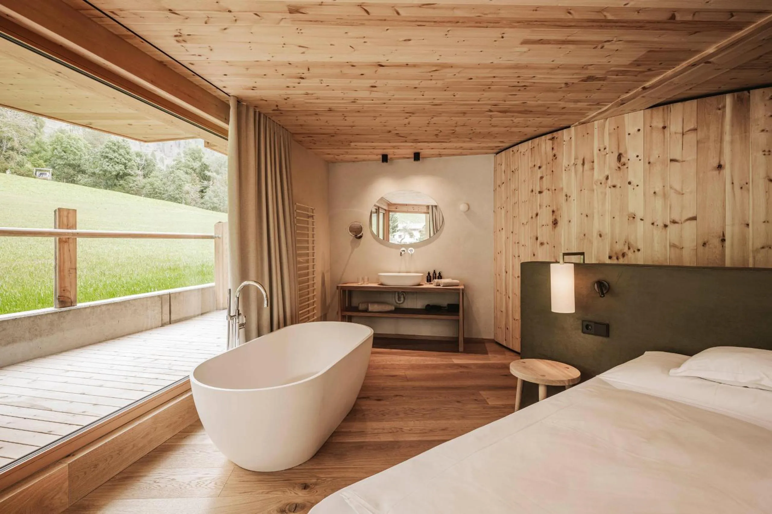 Bed in Naturhotel Lüsnerhof