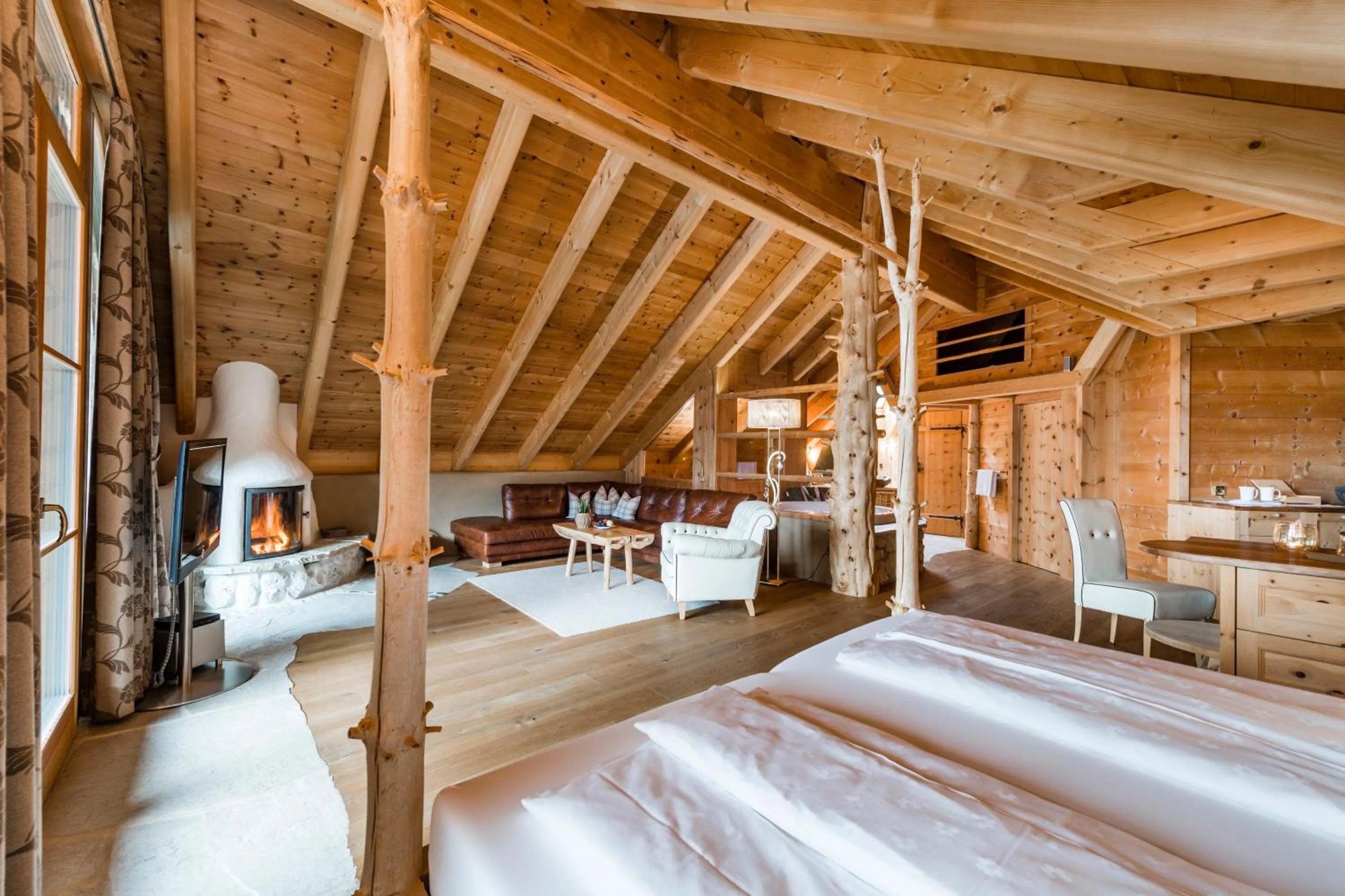 Bed in Naturhotel Lüsnerhof