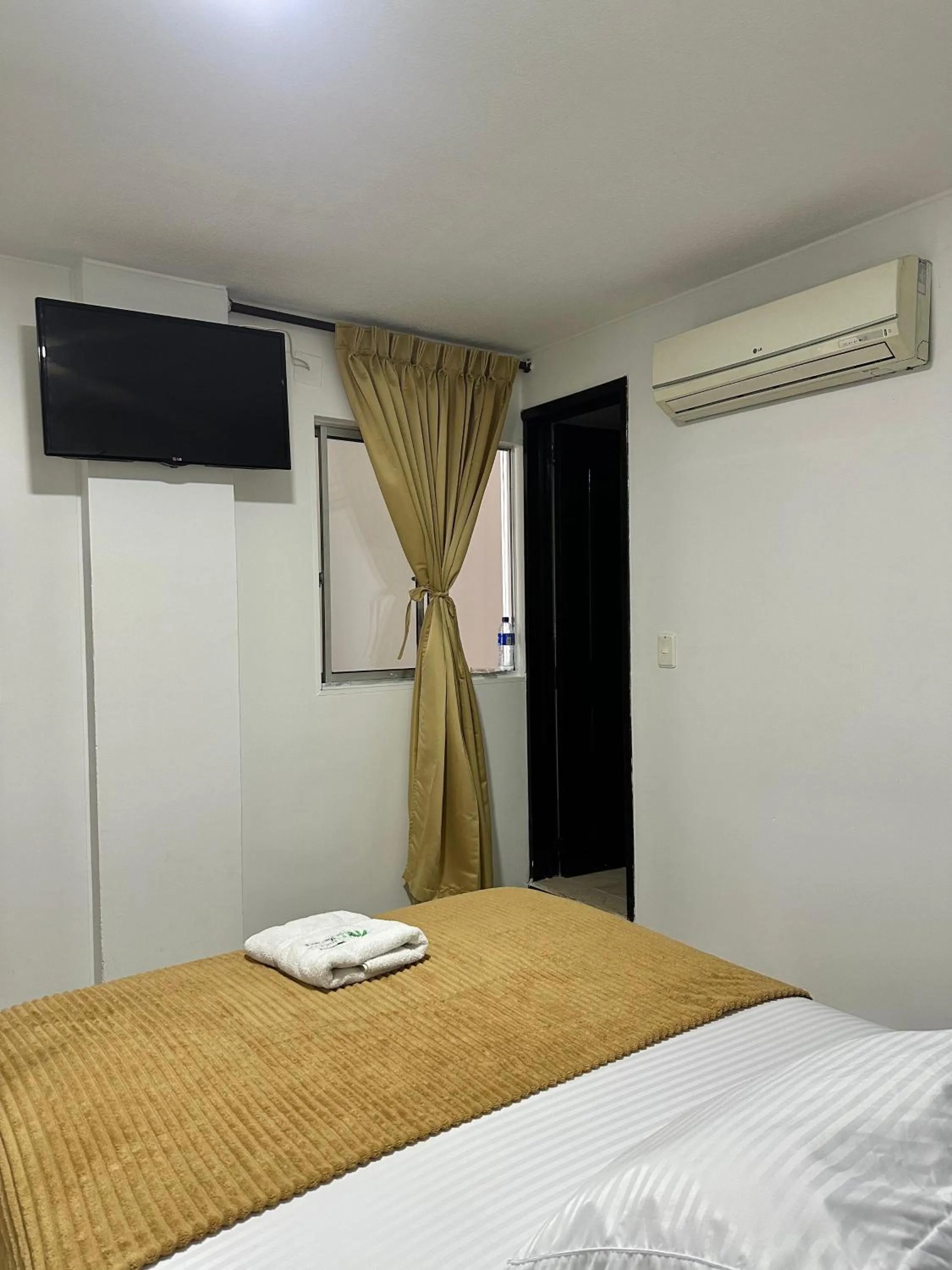 Bed in Hotel Palmeras De Mariana