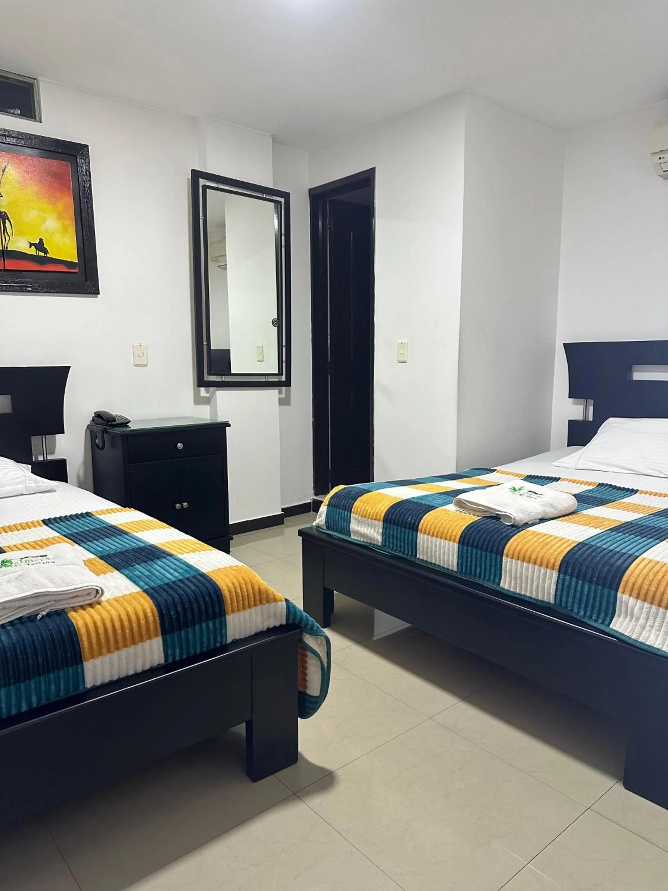 Bed in Hotel Palmeras De Mariana