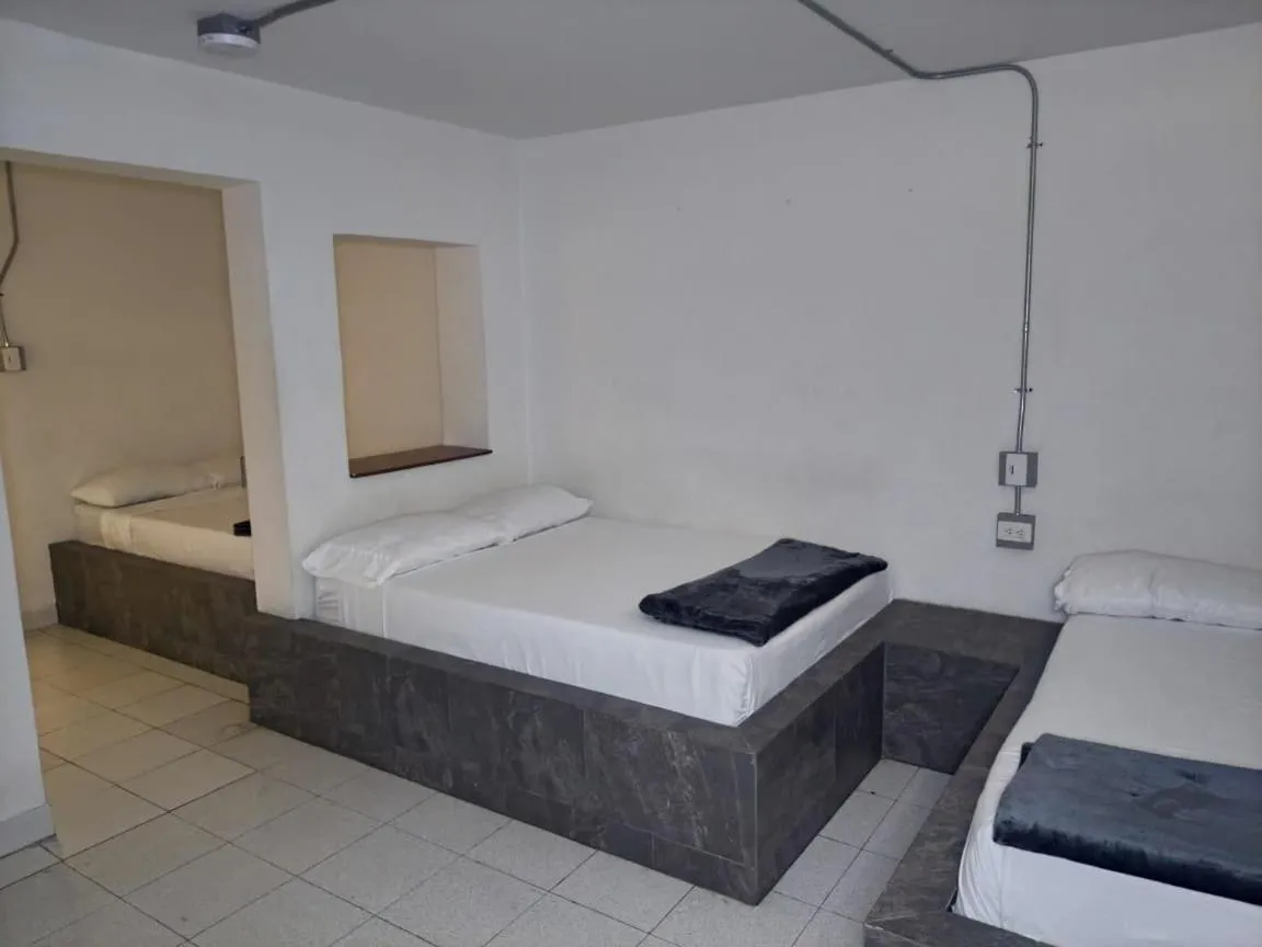 Bed in Hotel Villa Nueva Comfort