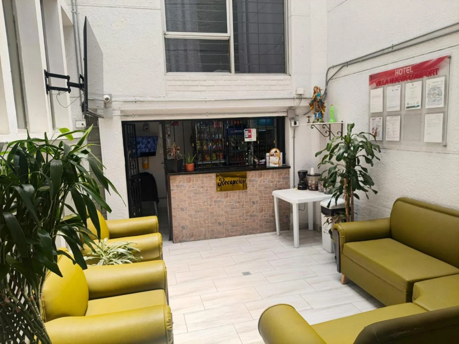 Lobby or reception in Hotel Villa Nueva Comfort