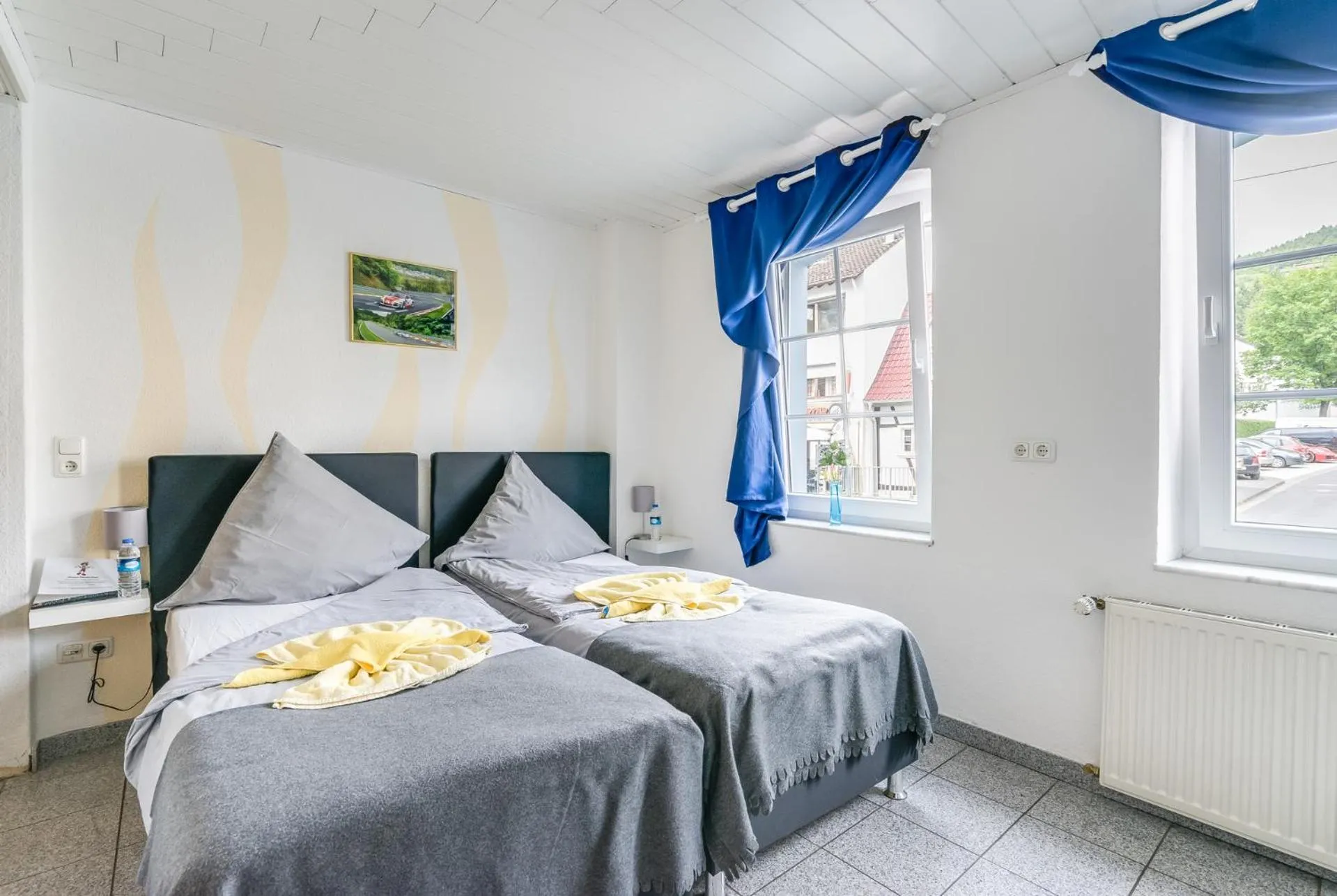 Photo of the whole room, Bed in Nurburgring Rooms Pinocchio