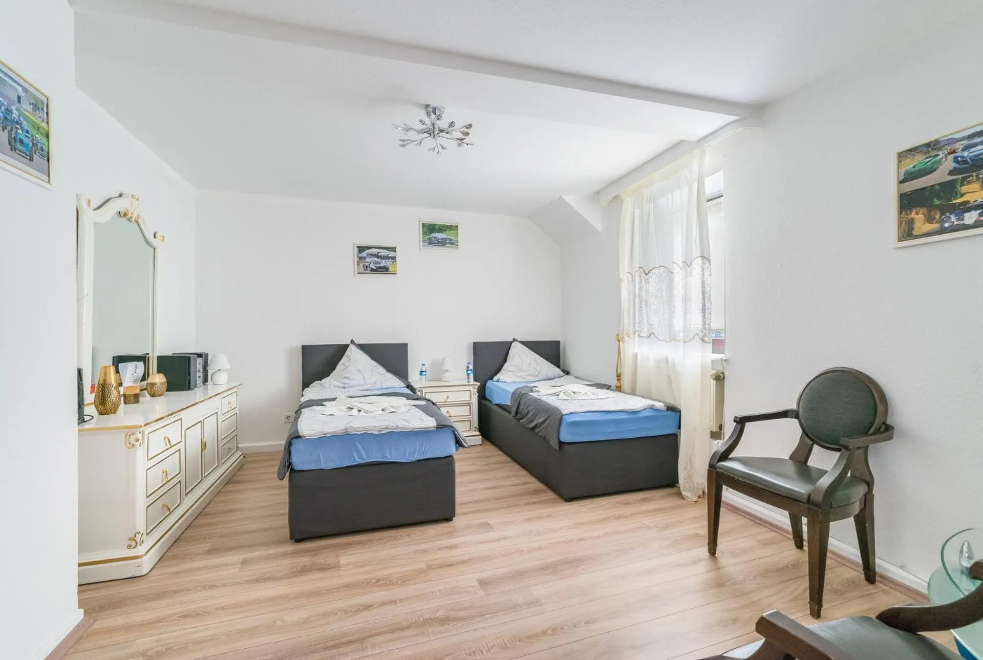 Photo of the whole room, Bed in Nurburgring Rooms Pinocchio