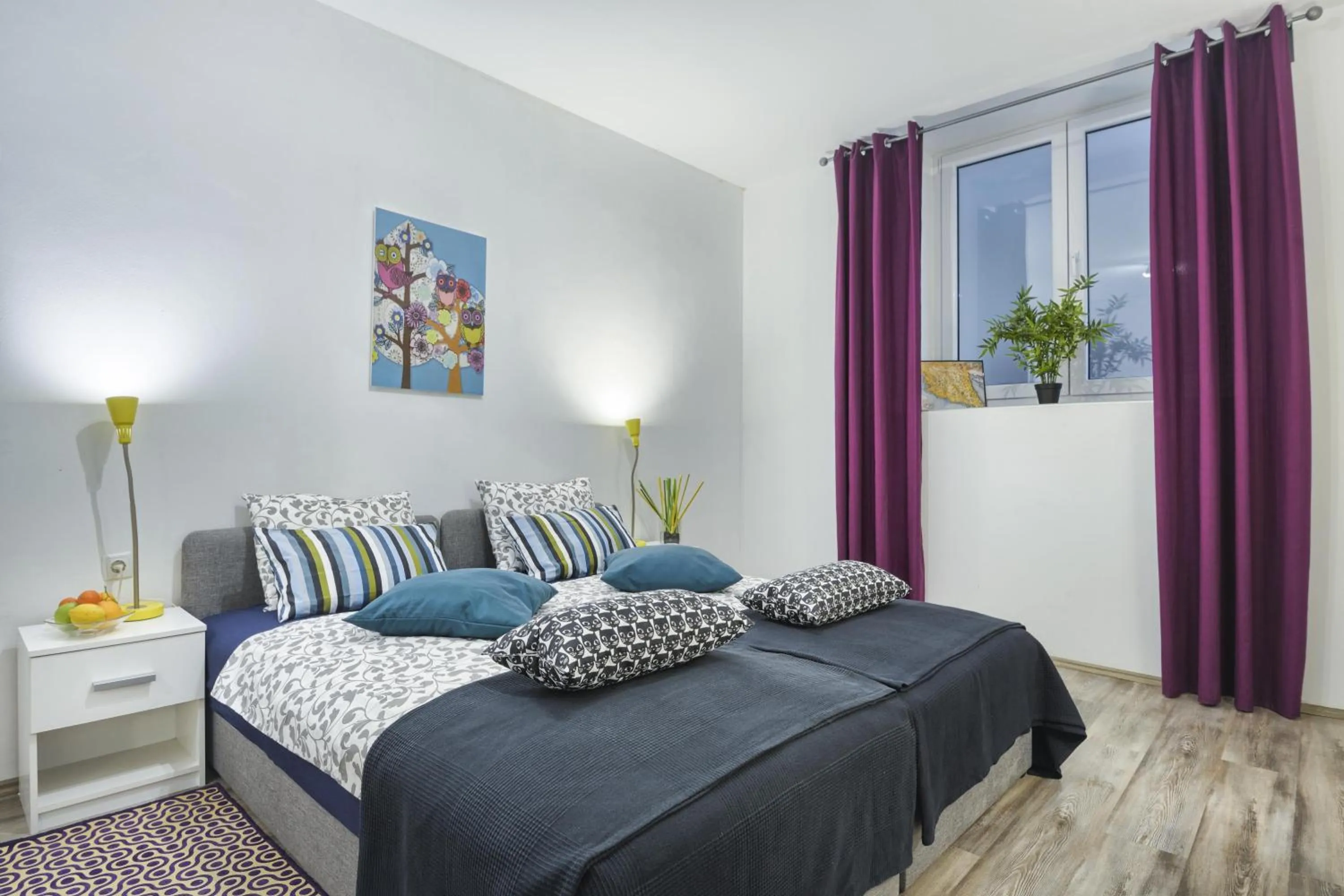 Photo of the whole room, Bed in Top Center Rooms & Studio