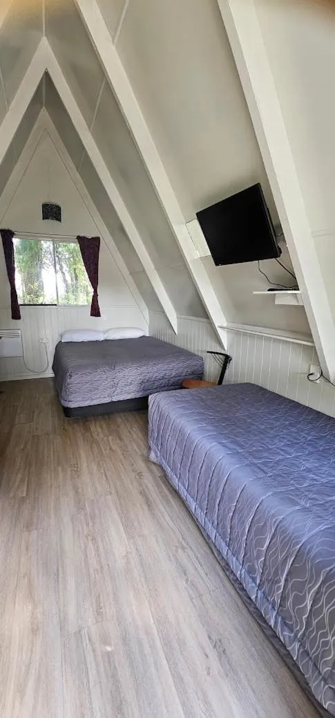 Bed in Westport Kiwi Holiday Park & Motels