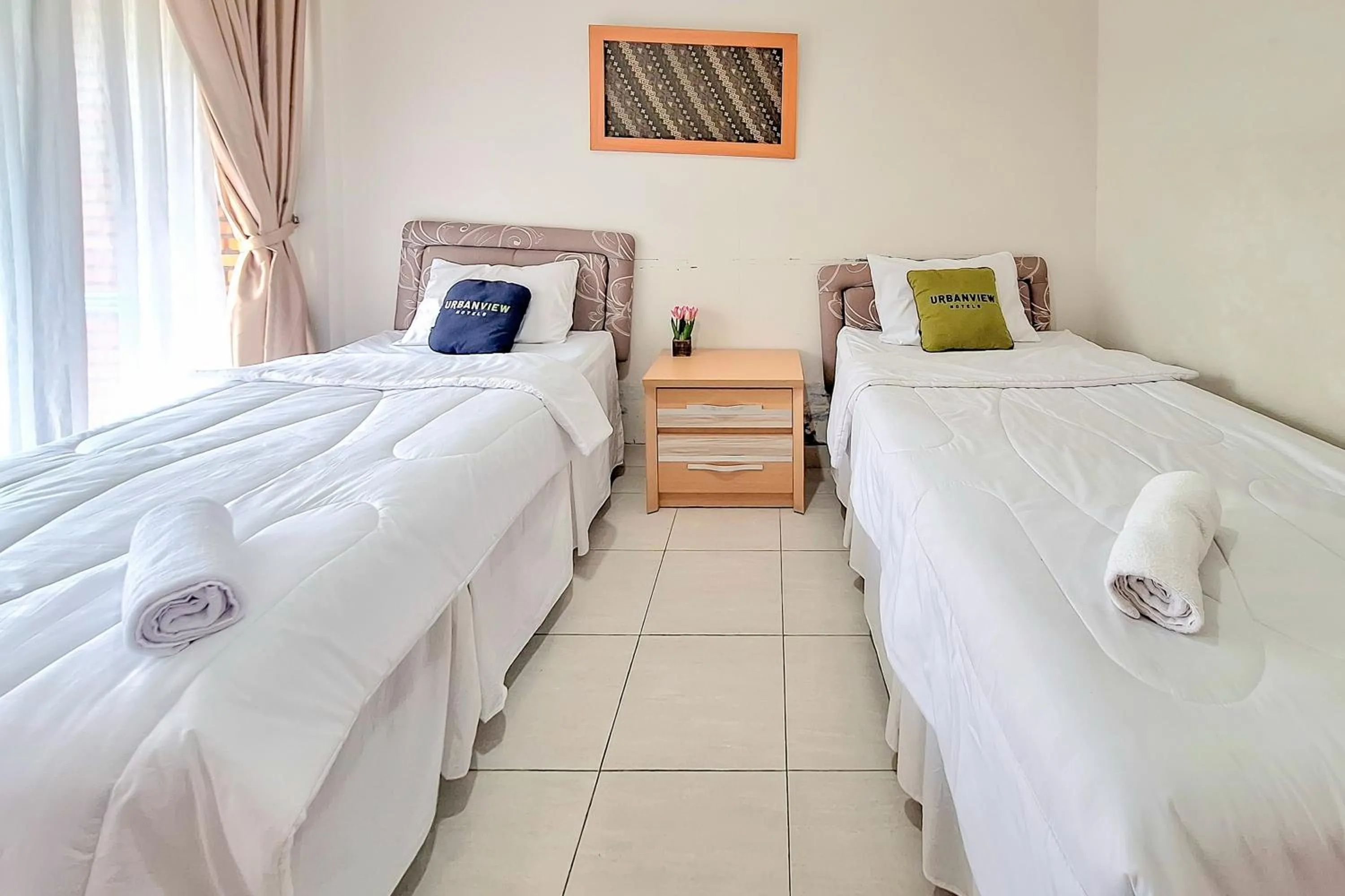 Bedroom, Bed in Urbanview Hotel Tridaya Cisarua Puncak