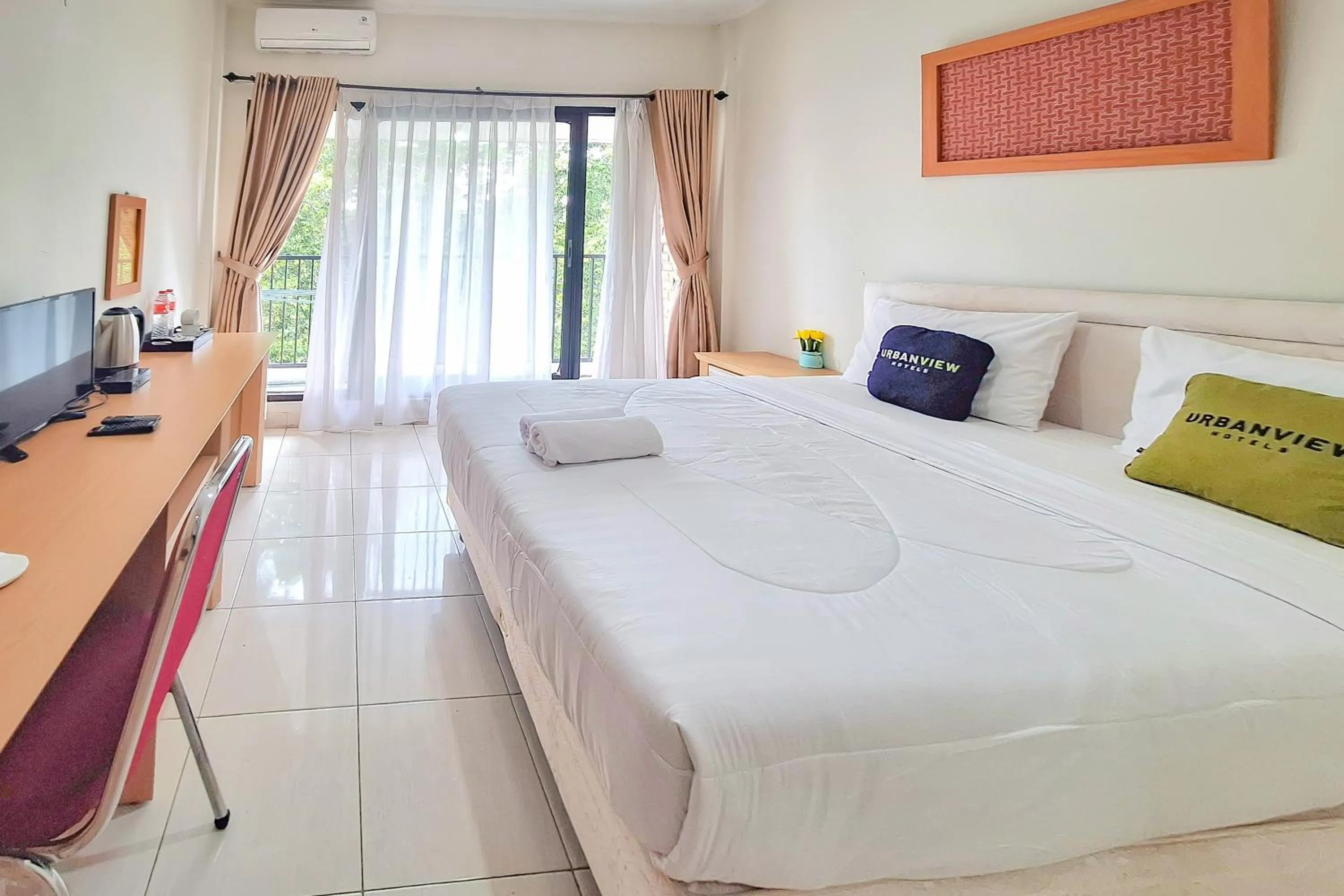 Bedroom, Bed in Urbanview Hotel Tridaya Cisarua Puncak