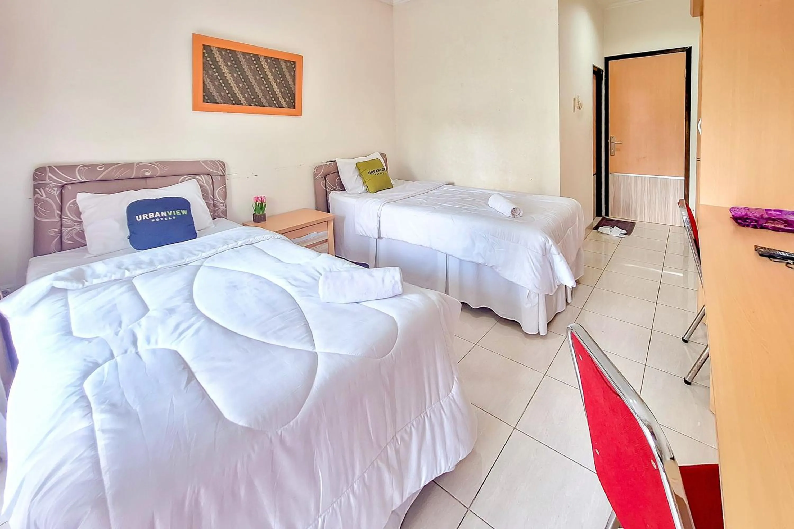 Bedroom, Bed in Urbanview Hotel Tridaya Cisarua Puncak