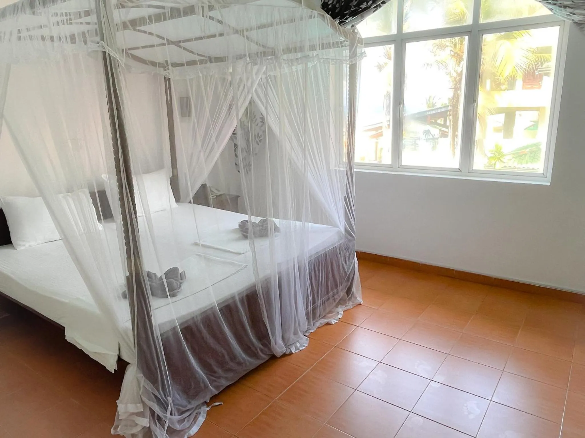 Photo of the whole room, Bed in Pearl Island Beach Hotel