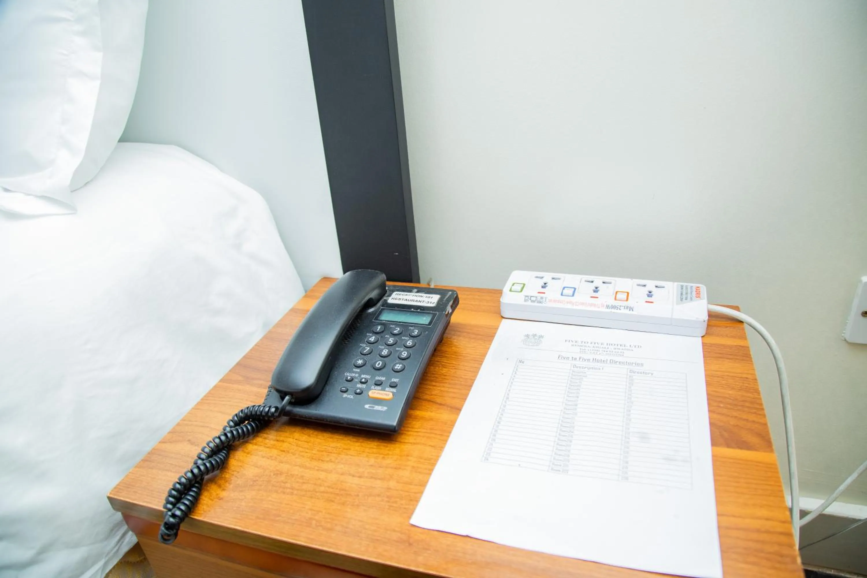 Seating area, Bed in Five to Five Hotel