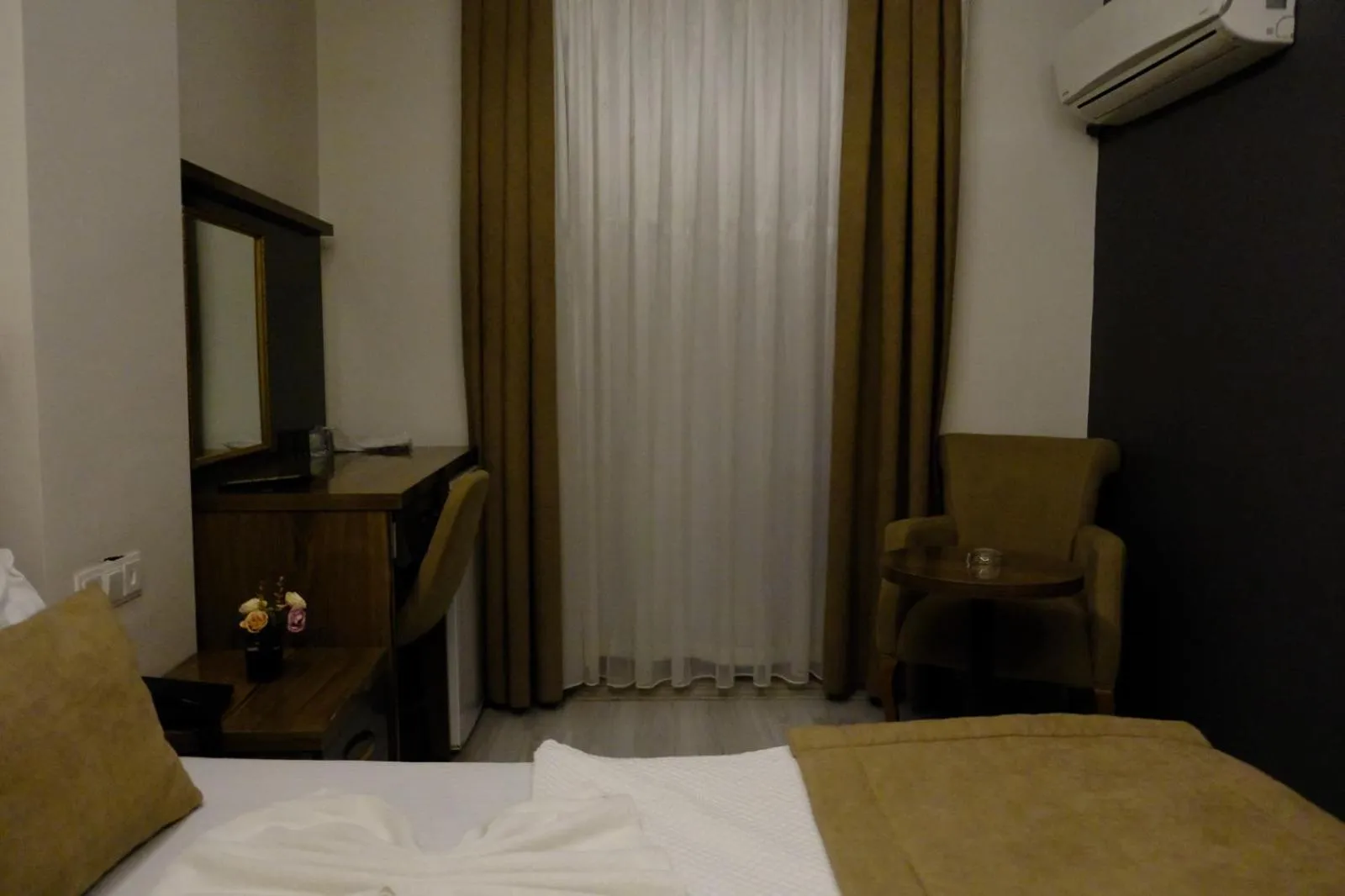 Bed in Grand Diamond Hotel