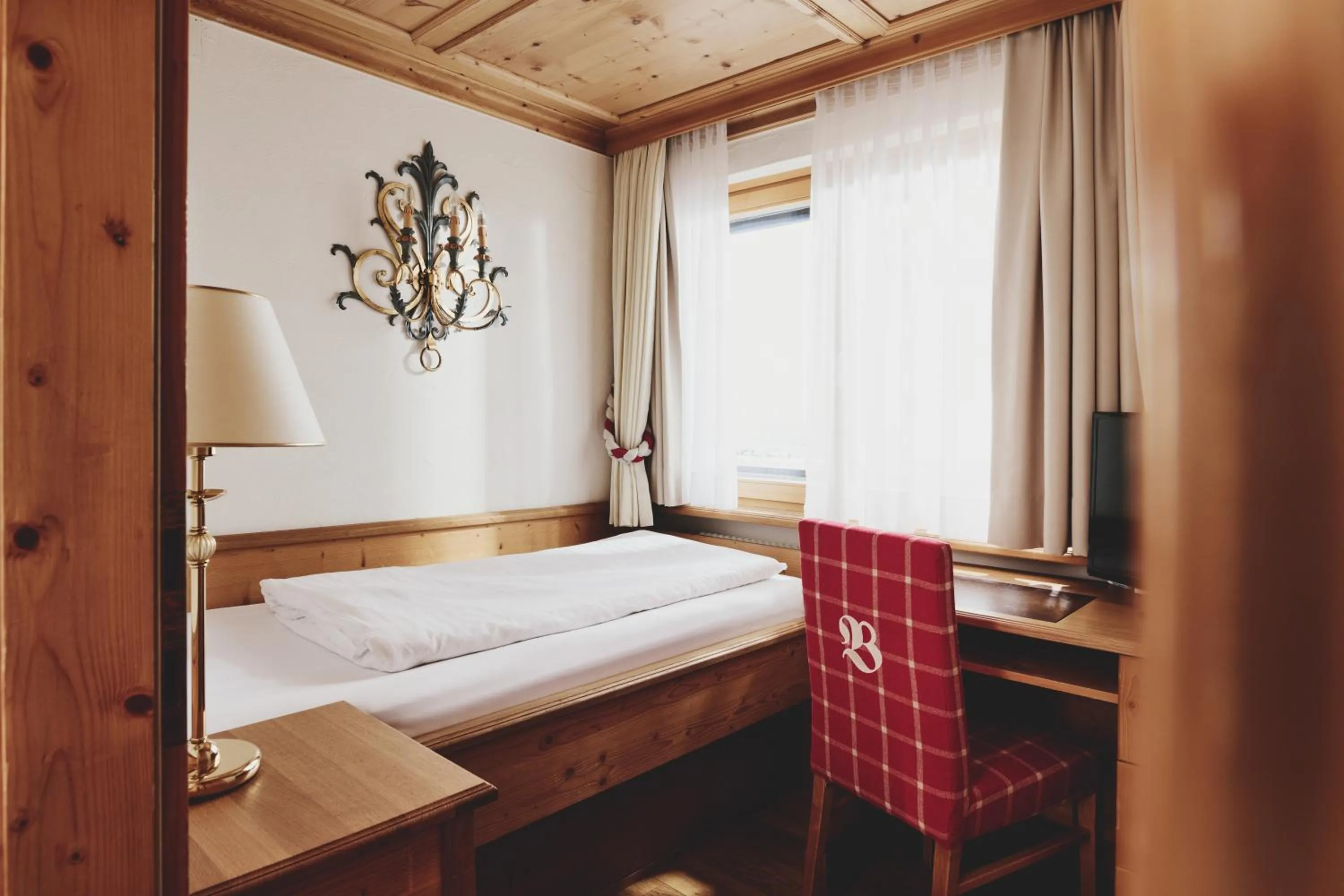Photo of the whole room, Bed in Burg Hotel Oberlech