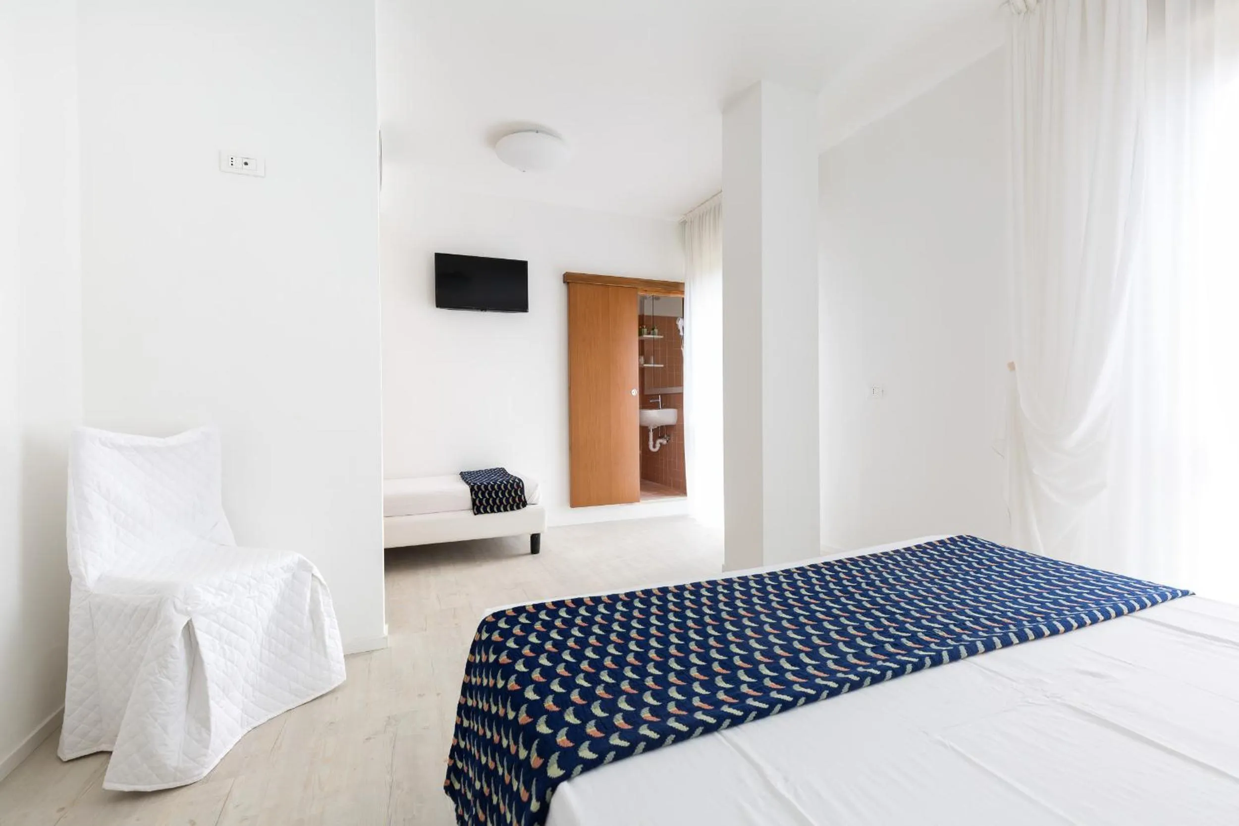 Bed in Hotel Cavallino Bianco