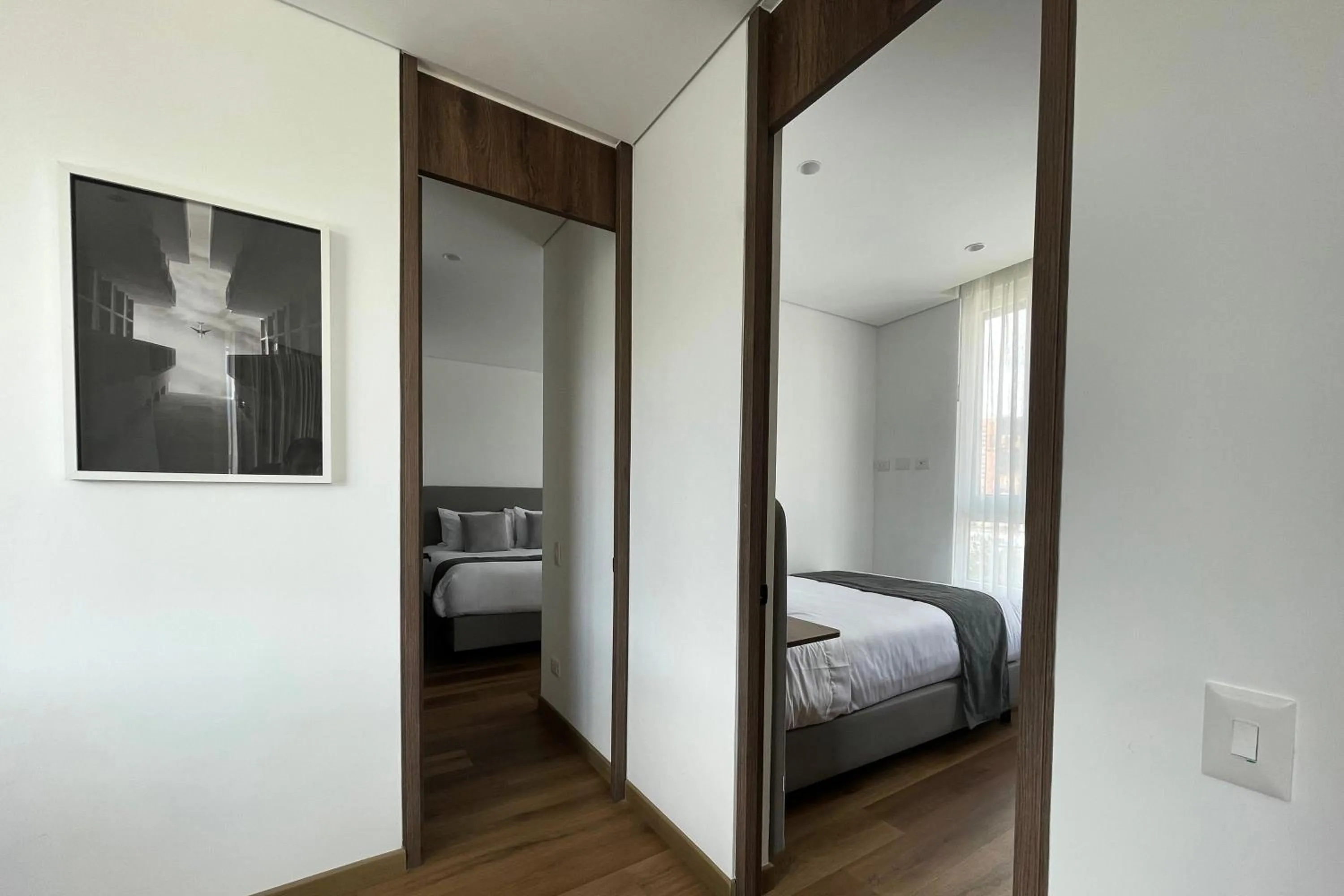 Bed in VOU Suites by Avia Suites