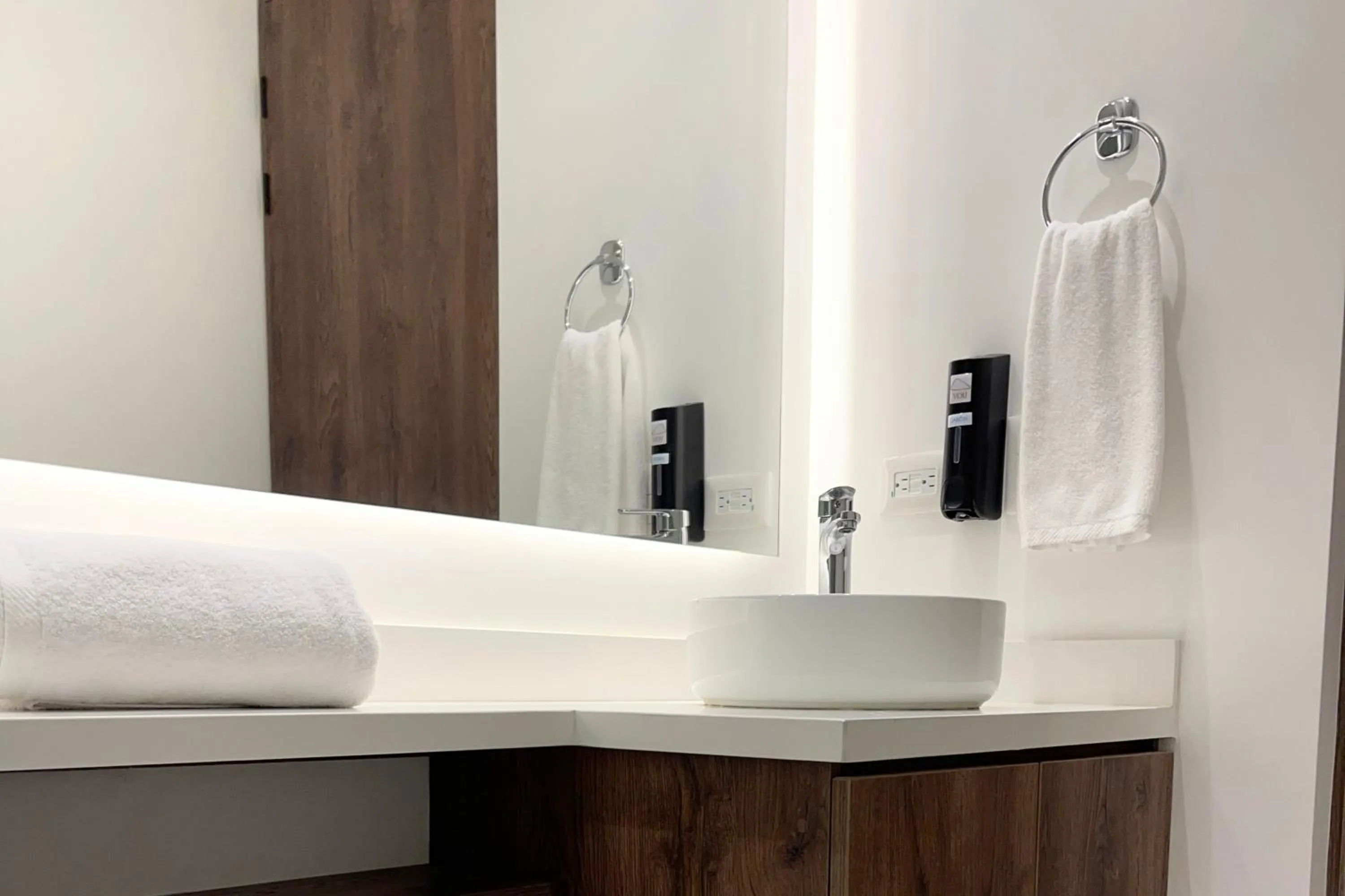 Bathroom, Bed in VOU Suites by Avia Suites