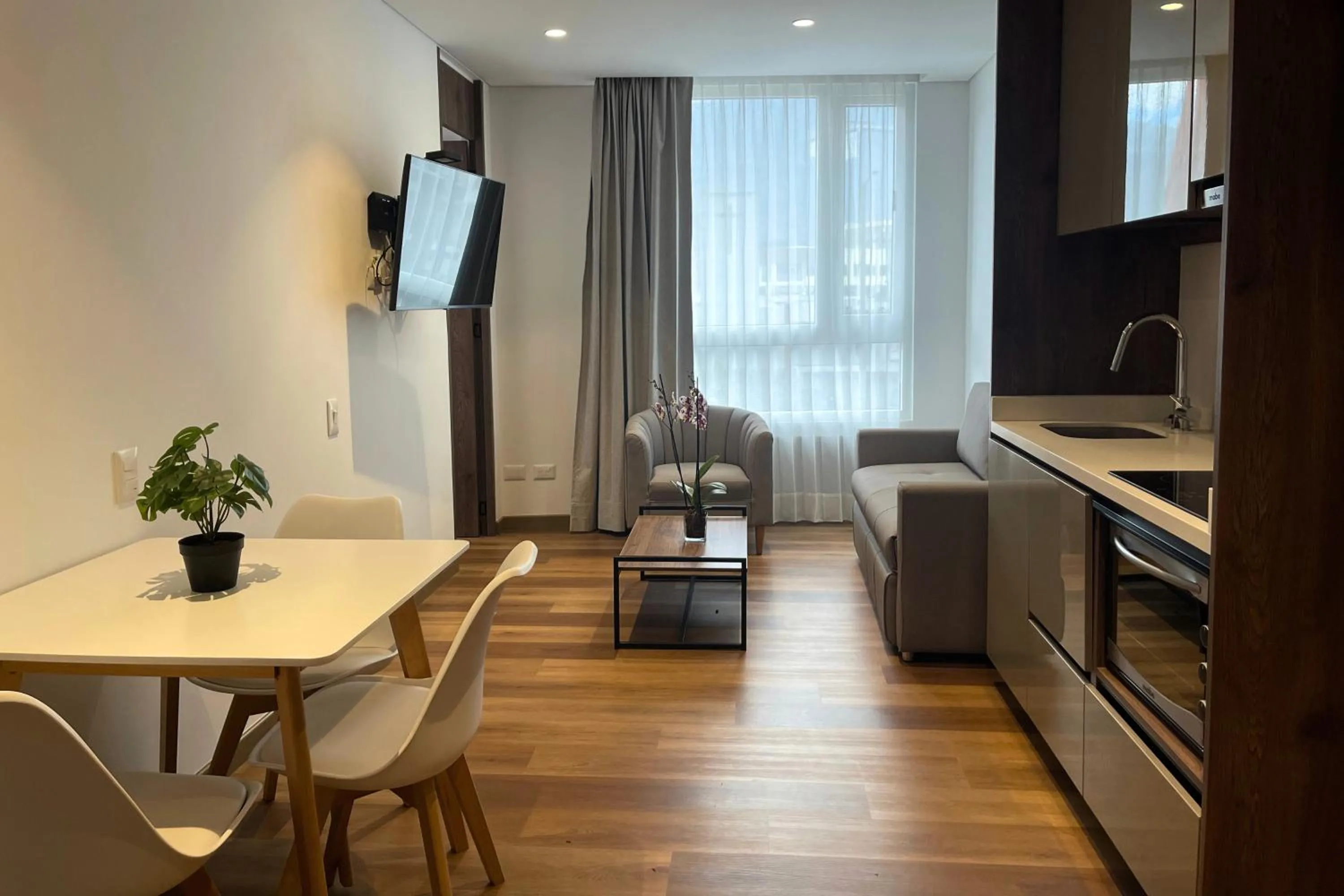 Bed in VOU Suites by Avia Suites