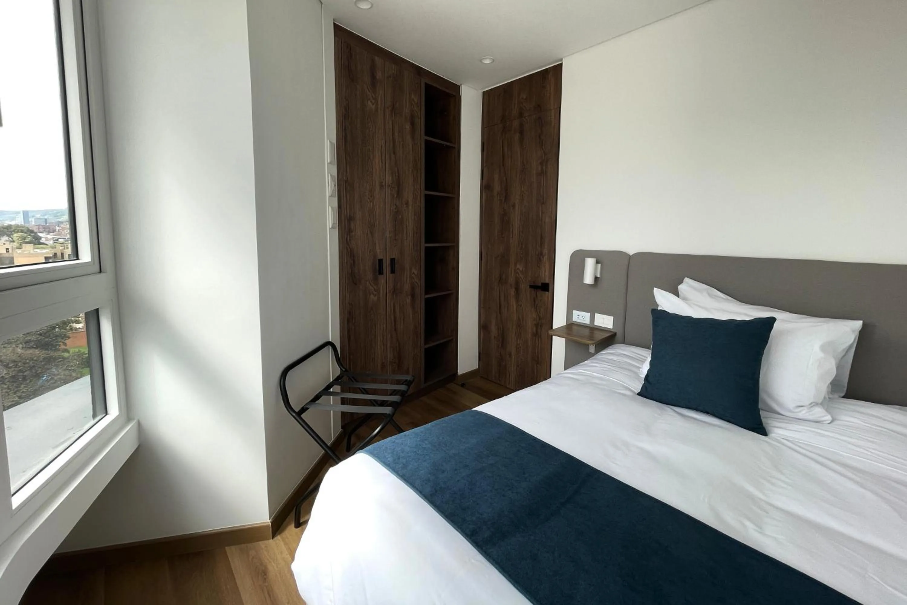 Bed in VOU Suites by Avia Suites