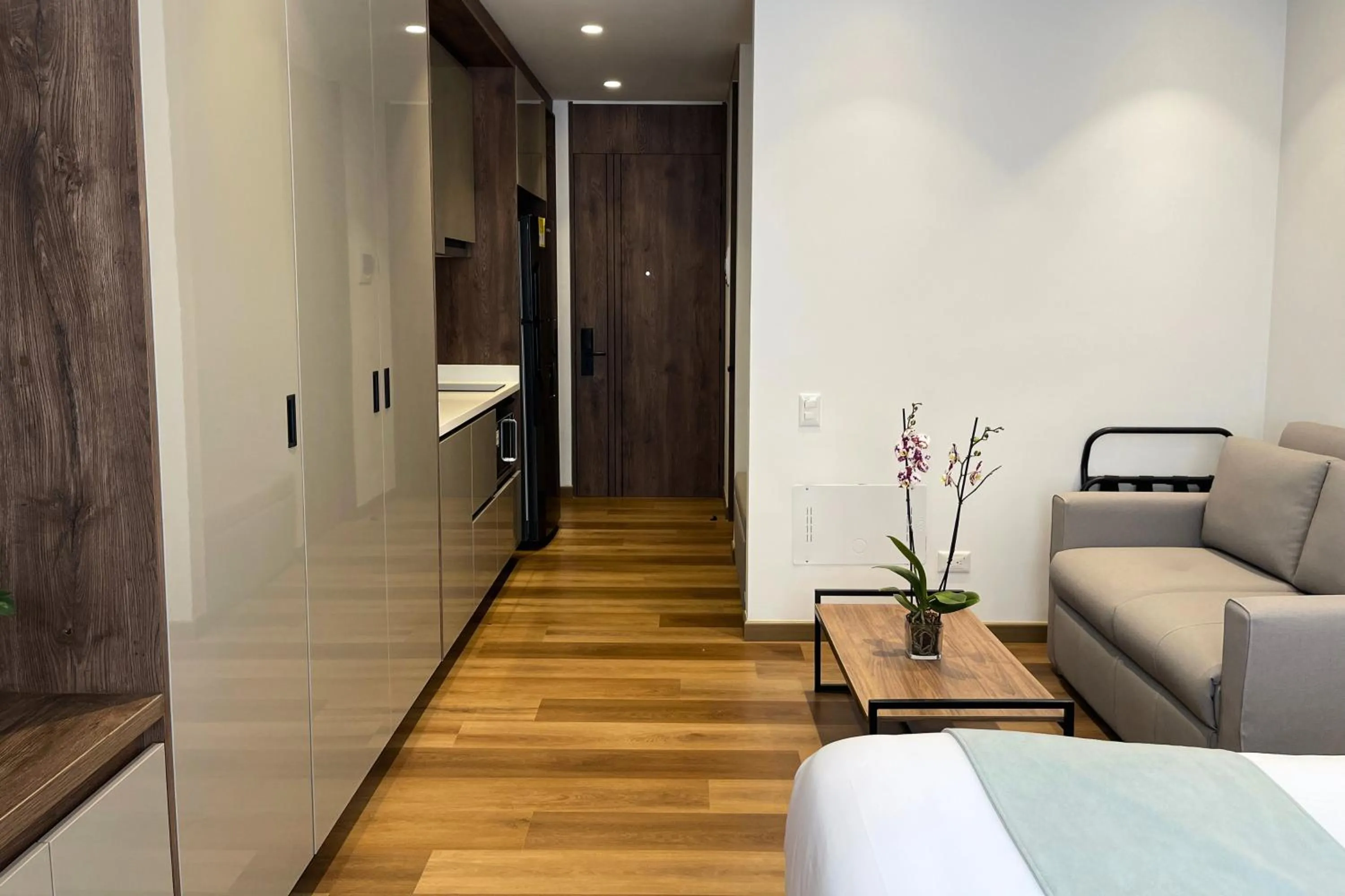 wardrobe, Bed in VOU Suites by Avia Suites