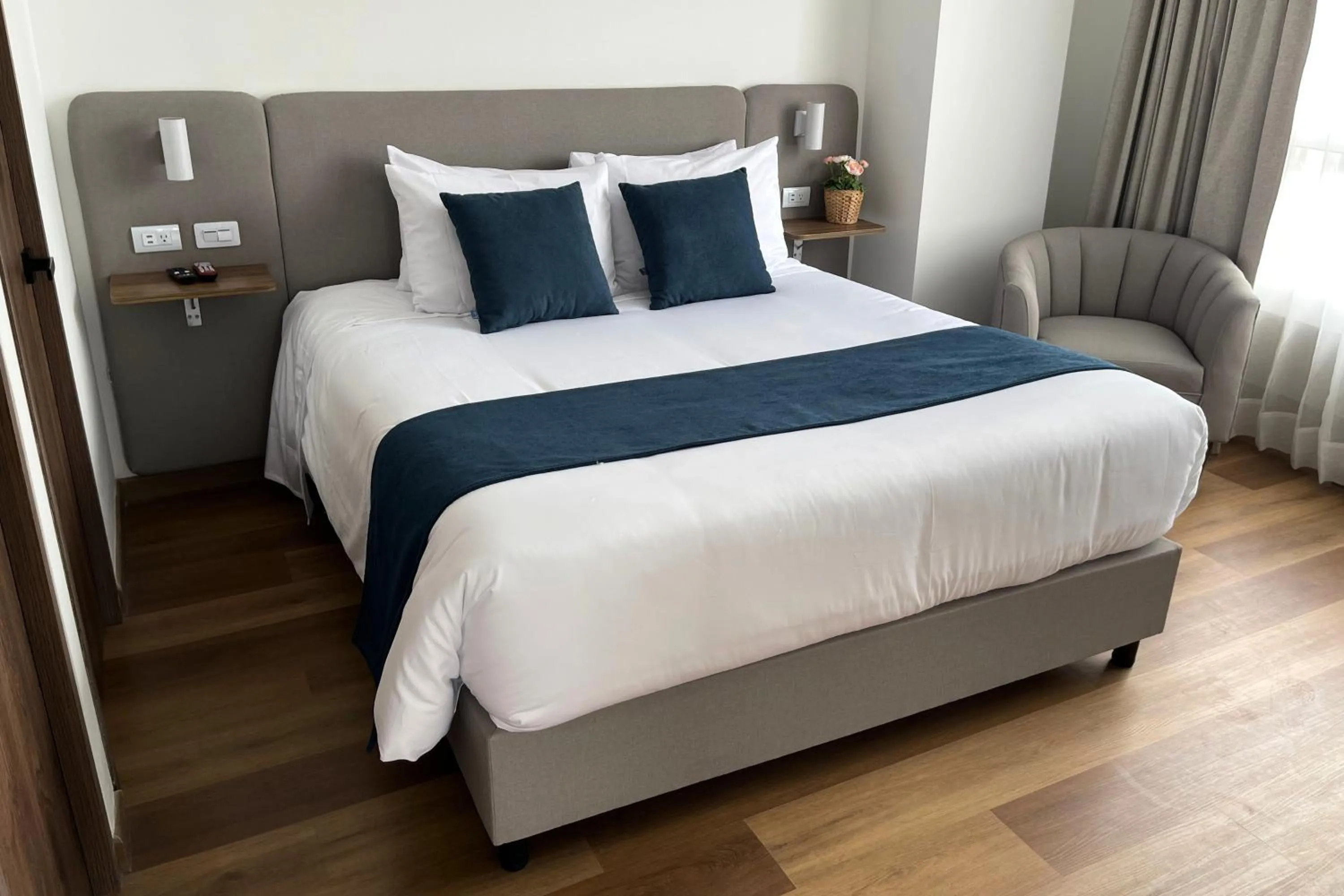 Bed in VOU Suites by Avia Suites