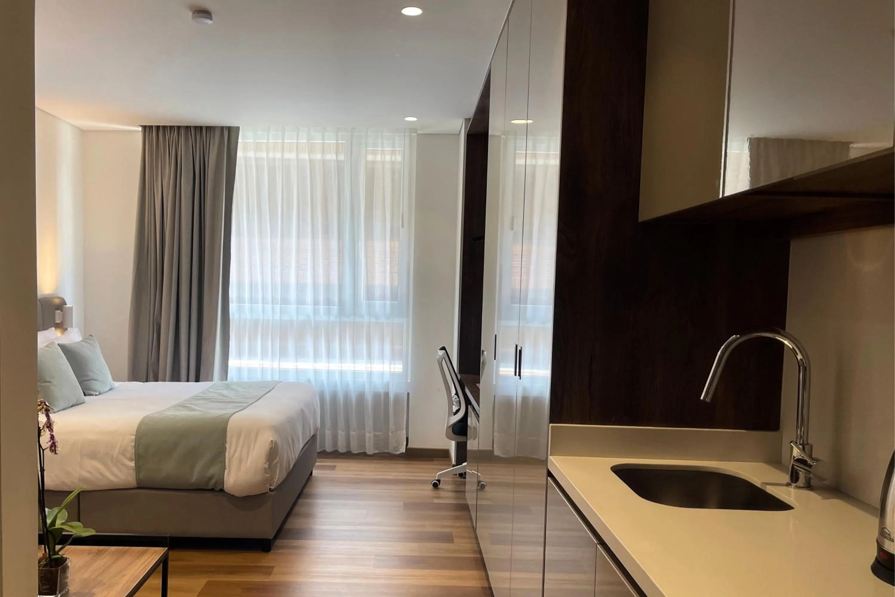 Bedroom, Bed in VOU Suites by Avia Suites