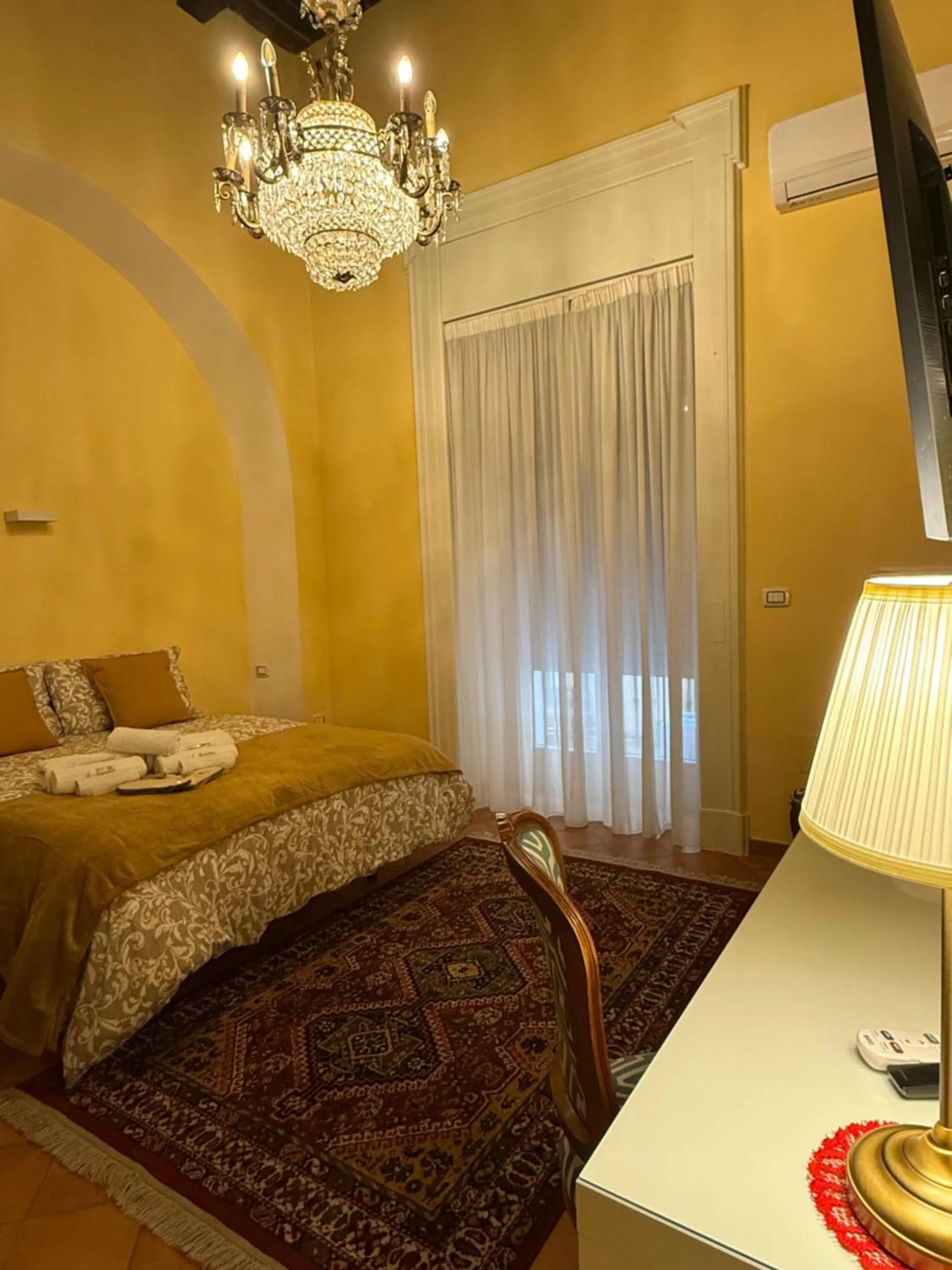 Bed in Palazzo Dogana Room&Suite