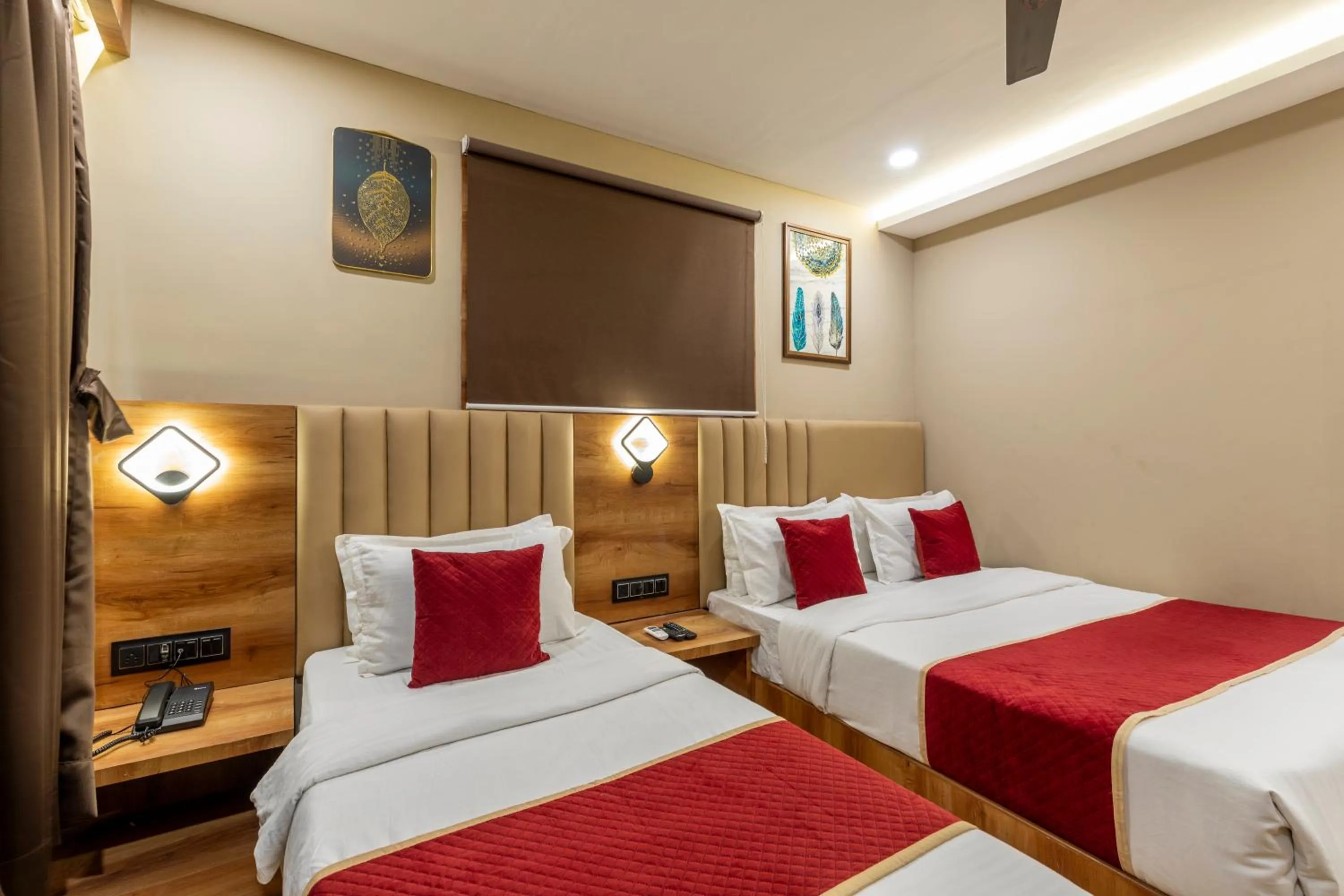 Bed in Hotel Zara International