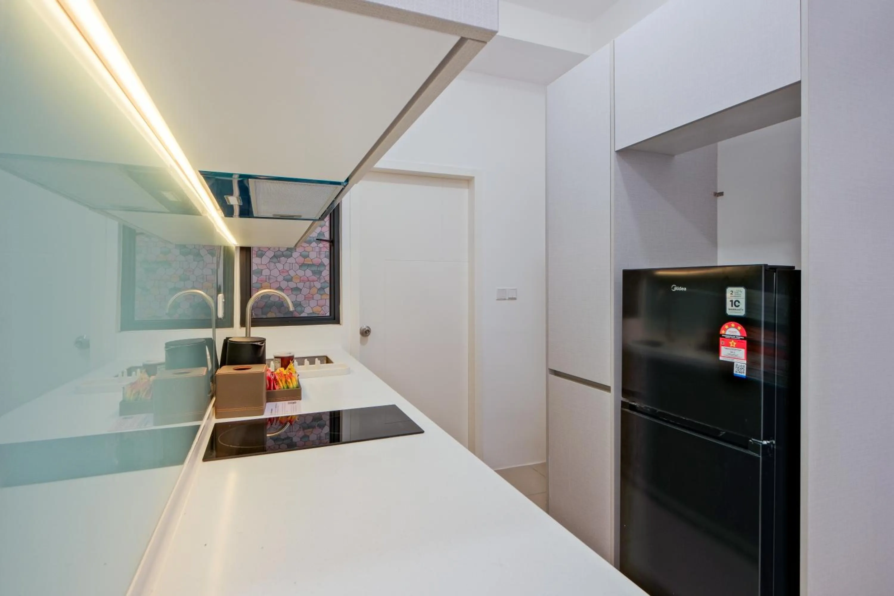 Kitchen or kitchenette, Bed in G Residence Sky Suite