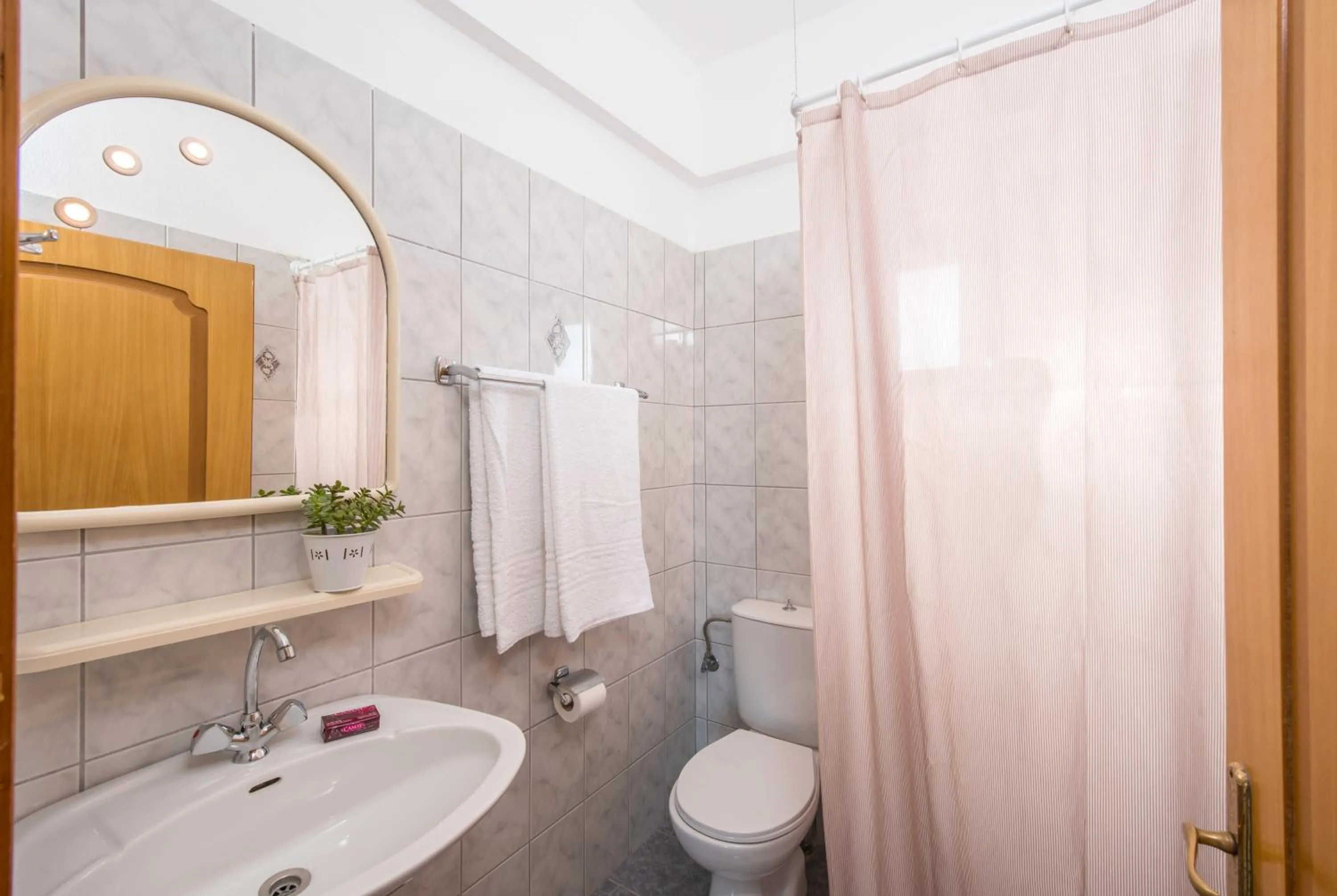 Bathroom in Elena's Beach Garden by Estia