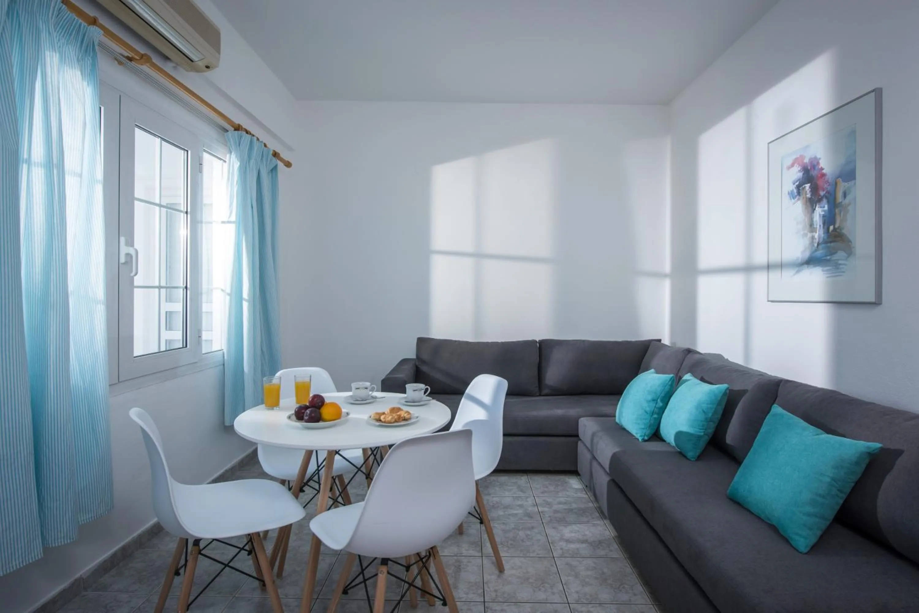 Living room in Elena's Beach Garden by Estia