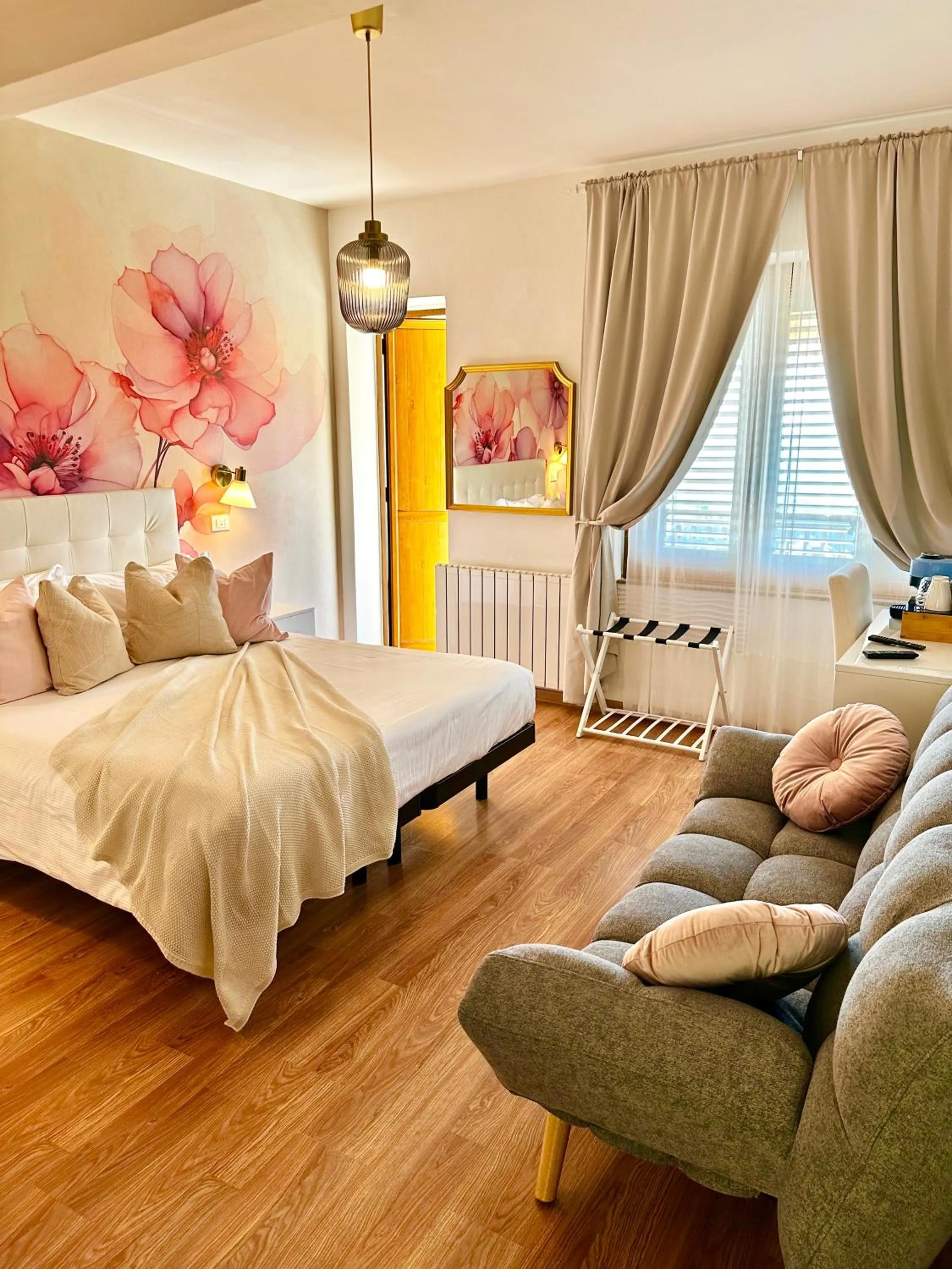 Bed in Villa Greta Hotel Rooms & Suites