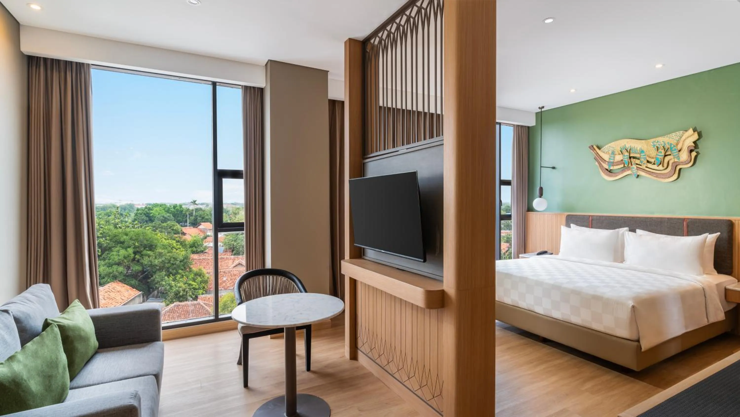 Living room, Bed in Swiss-Belinn Indramayu