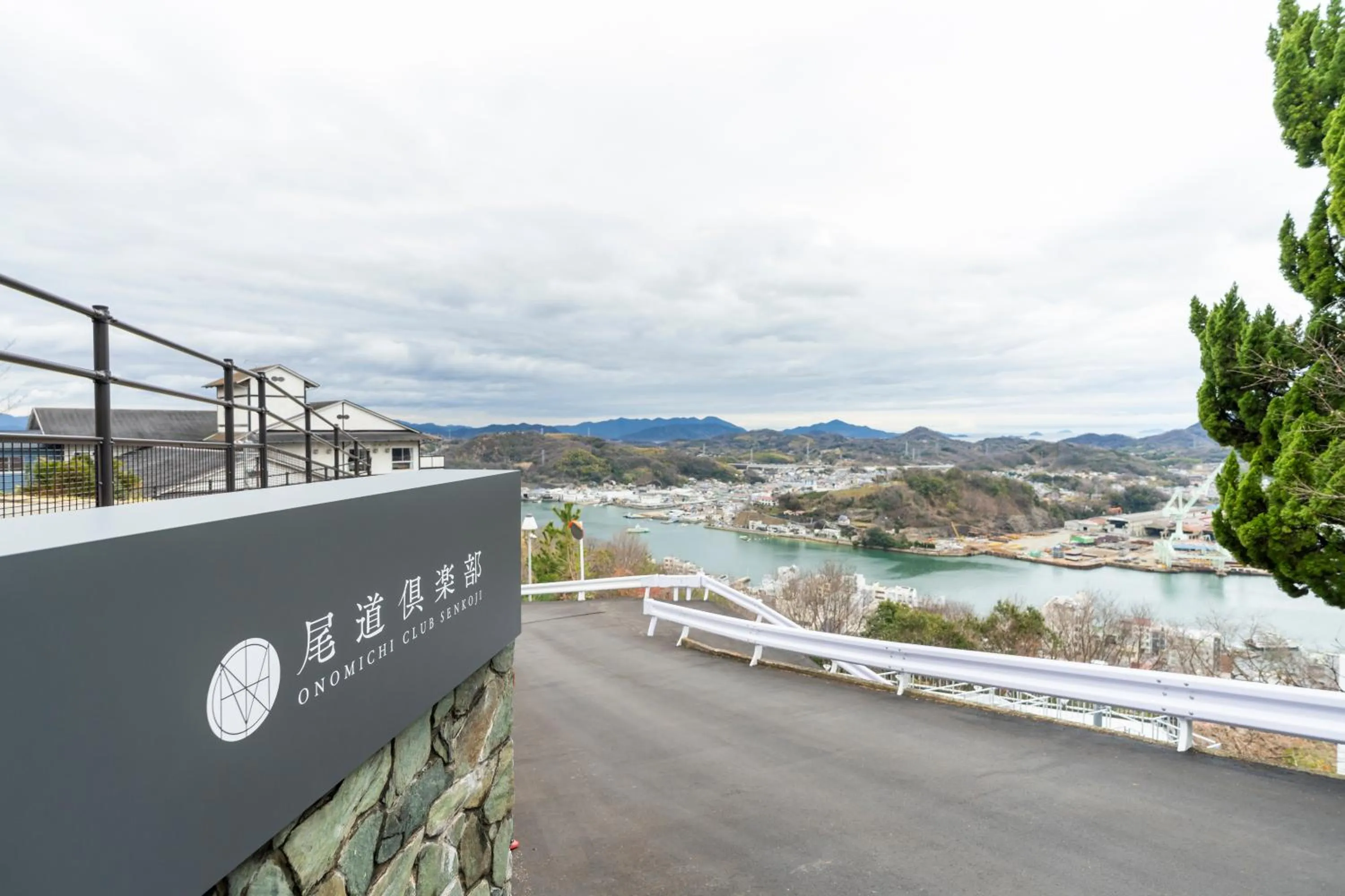 Property logo or sign in Onomichi Club