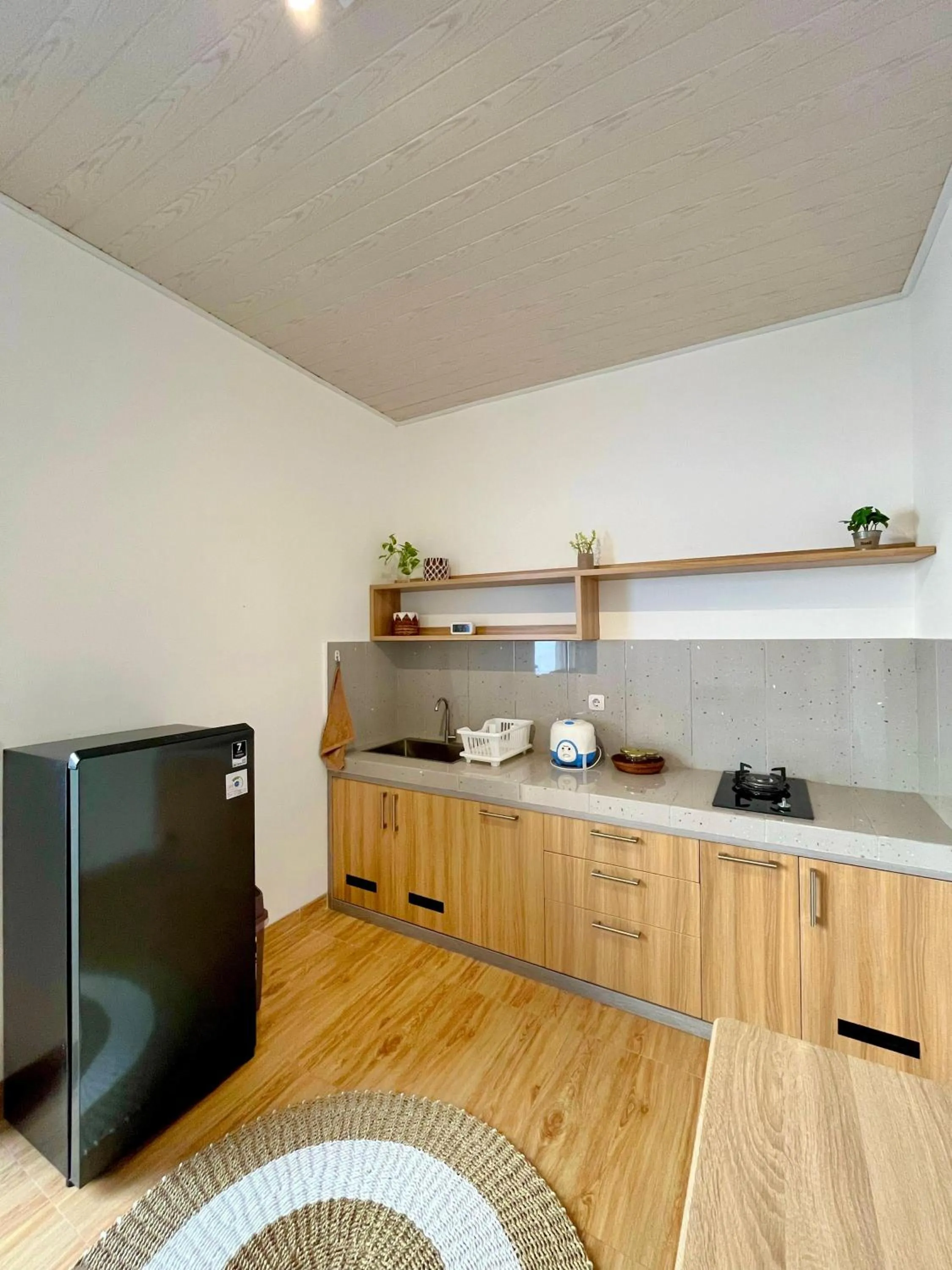 Kitchen or kitchenette in Sampai Living Tugu