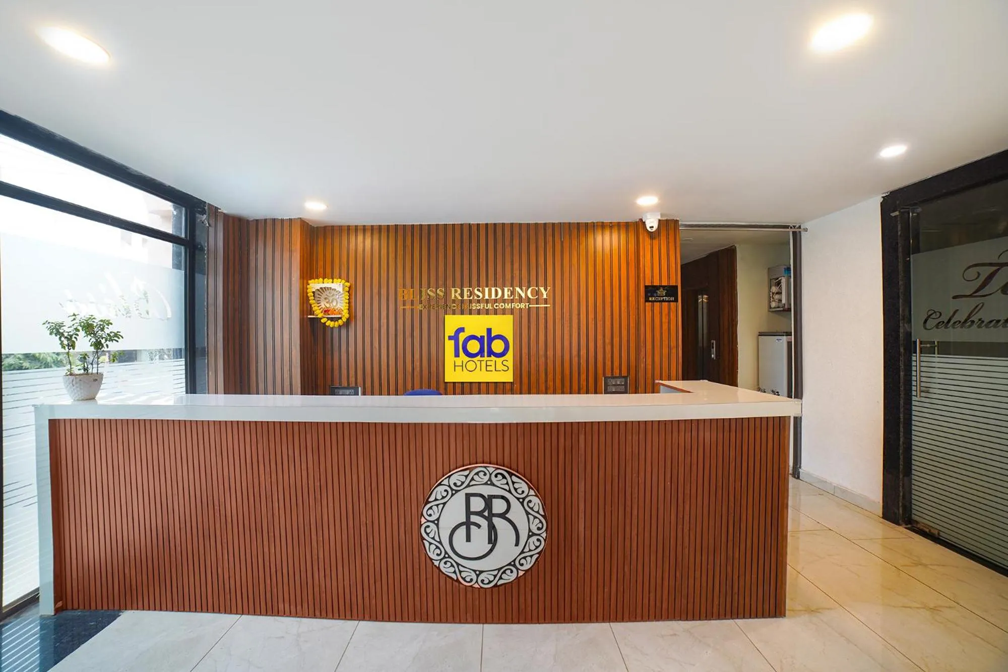 Lobby or reception in FabHotel Bliss Residency