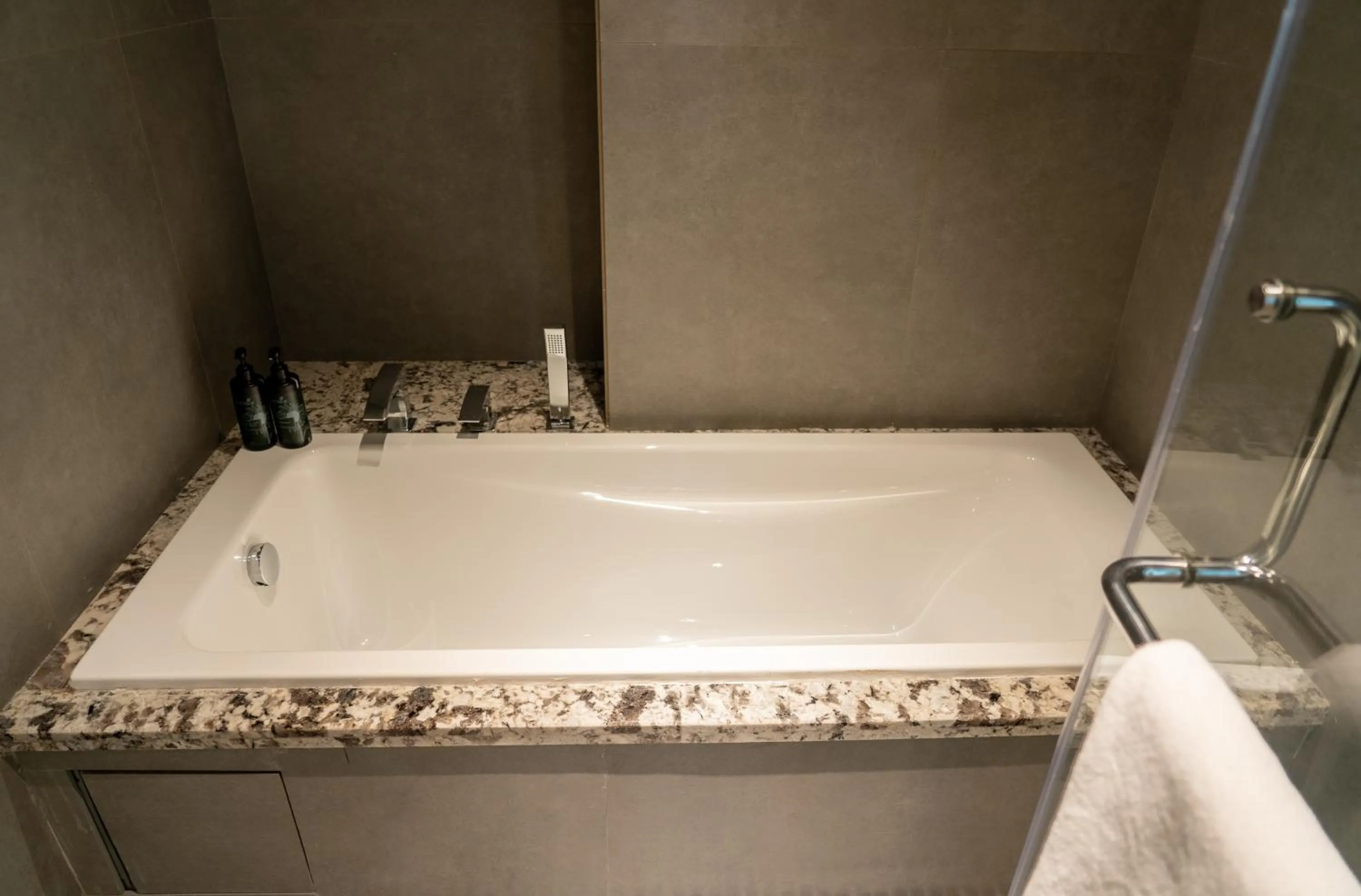 Bathroom in Ramada Encore By Wyndham Bhiwadi Phool Bagh Chowk