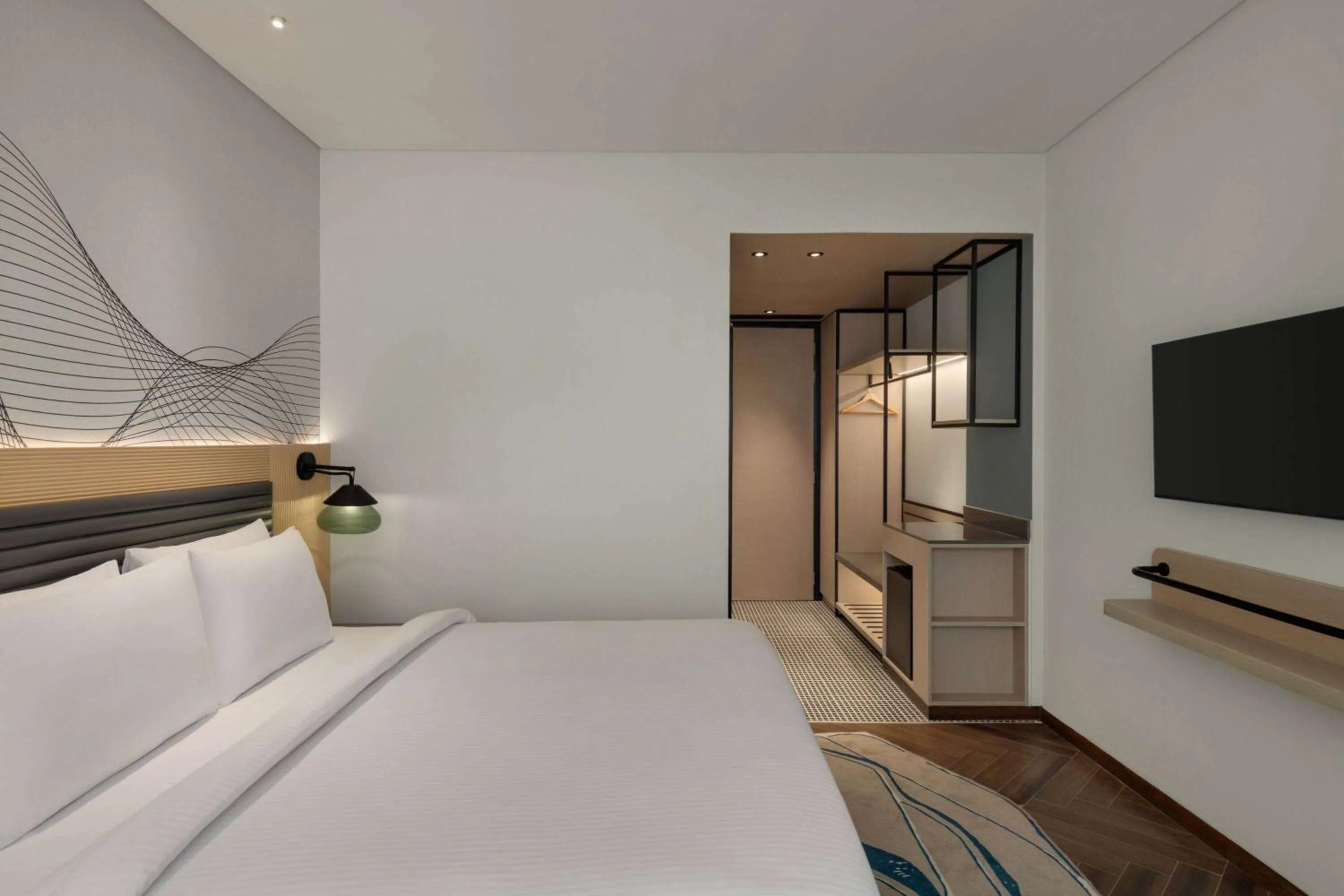 Photo of the whole room, Bed in Ramada Encore By Wyndham Bhiwadi Phool Bagh Chowk