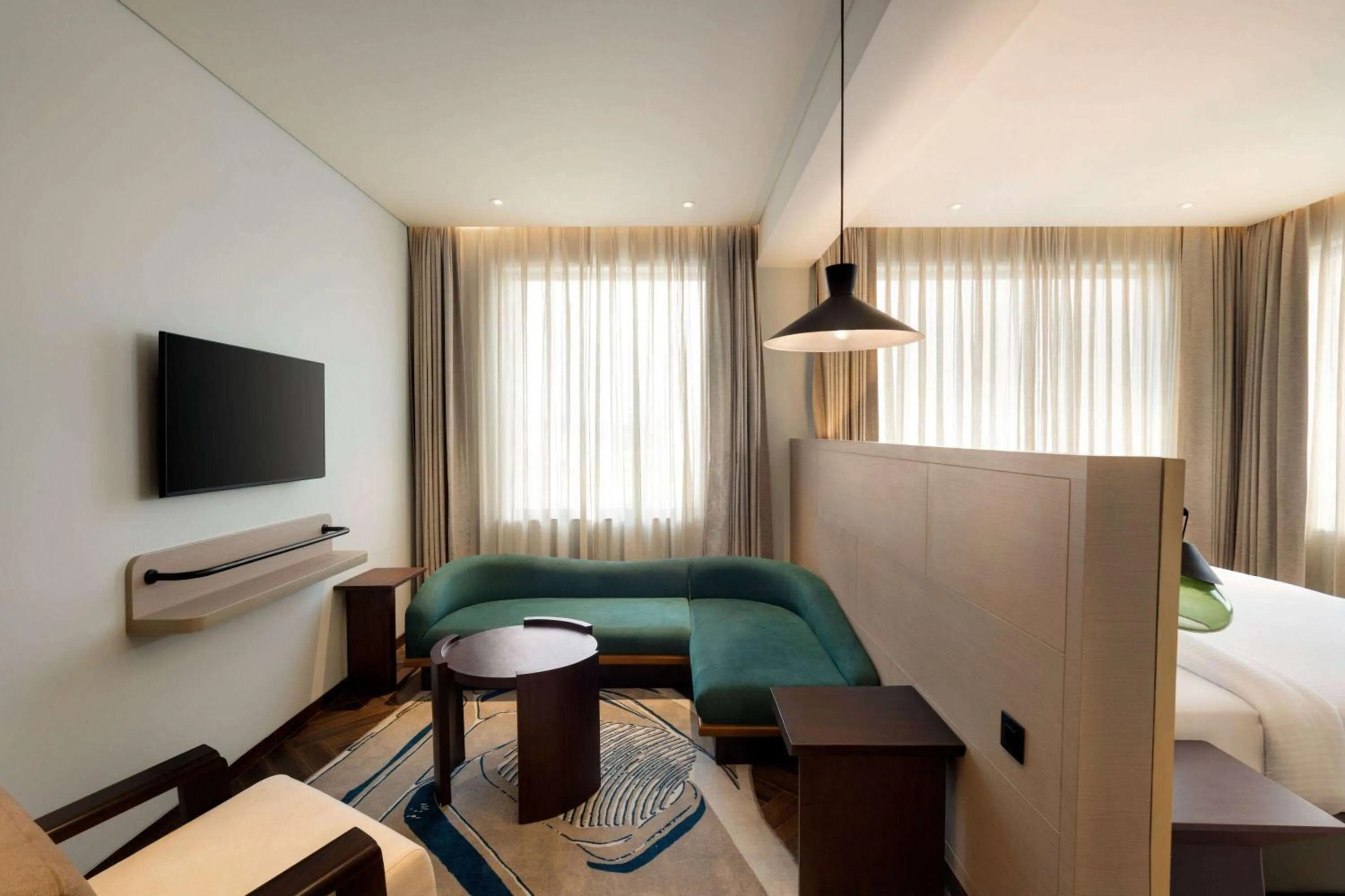 Photo of the whole room, Bed in Ramada Encore By Wyndham Bhiwadi Phool Bagh Chowk