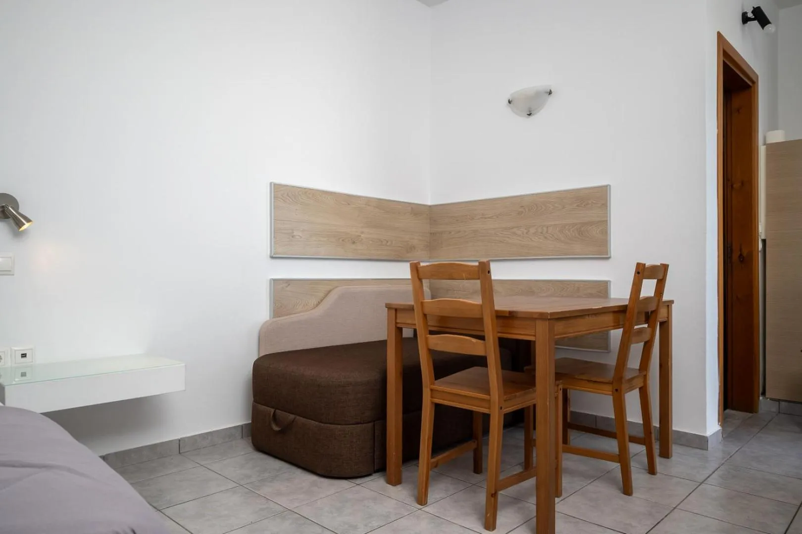 Bed in Triantafillas Suites