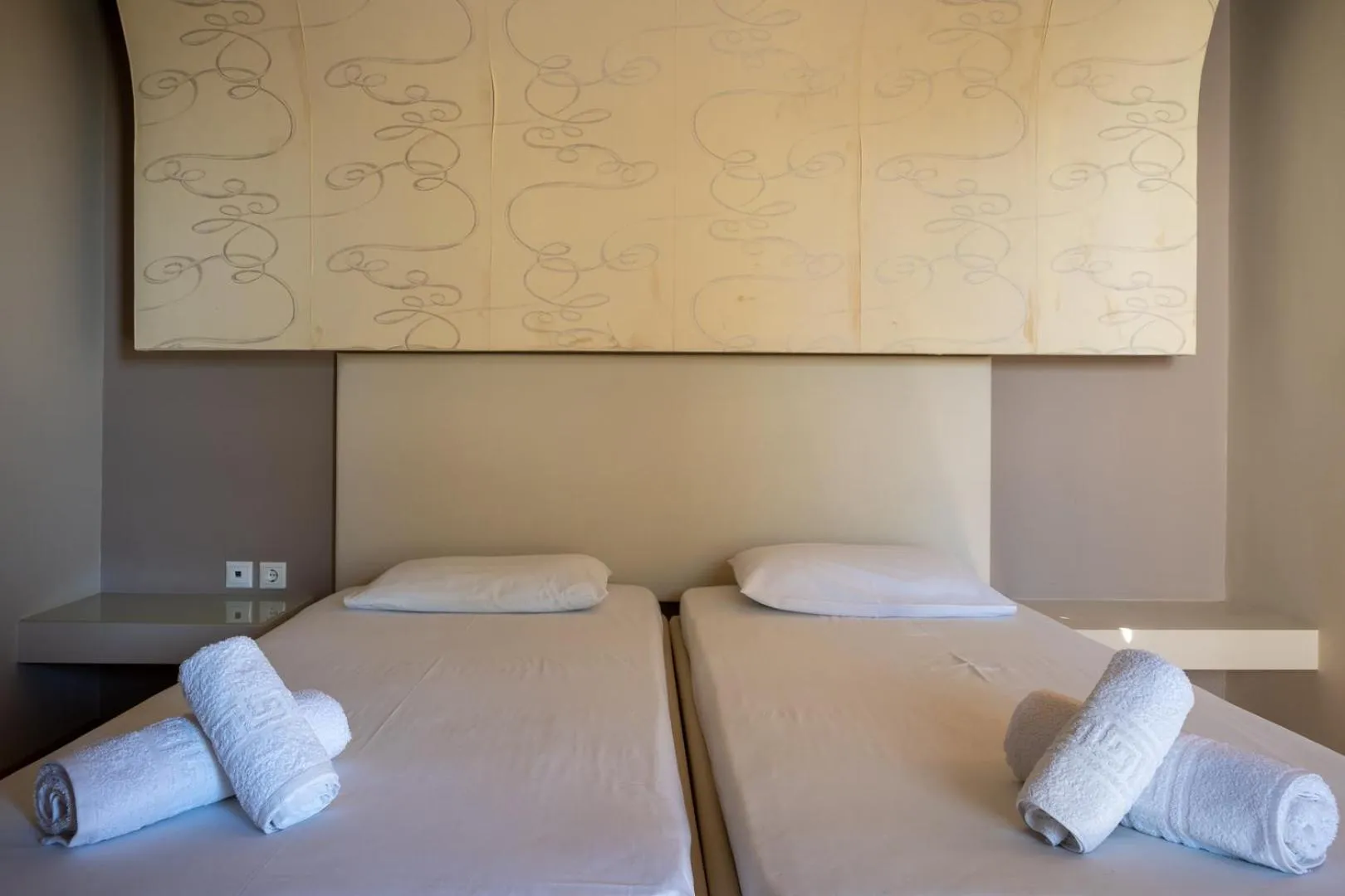 Bed in Triantafillas Suites