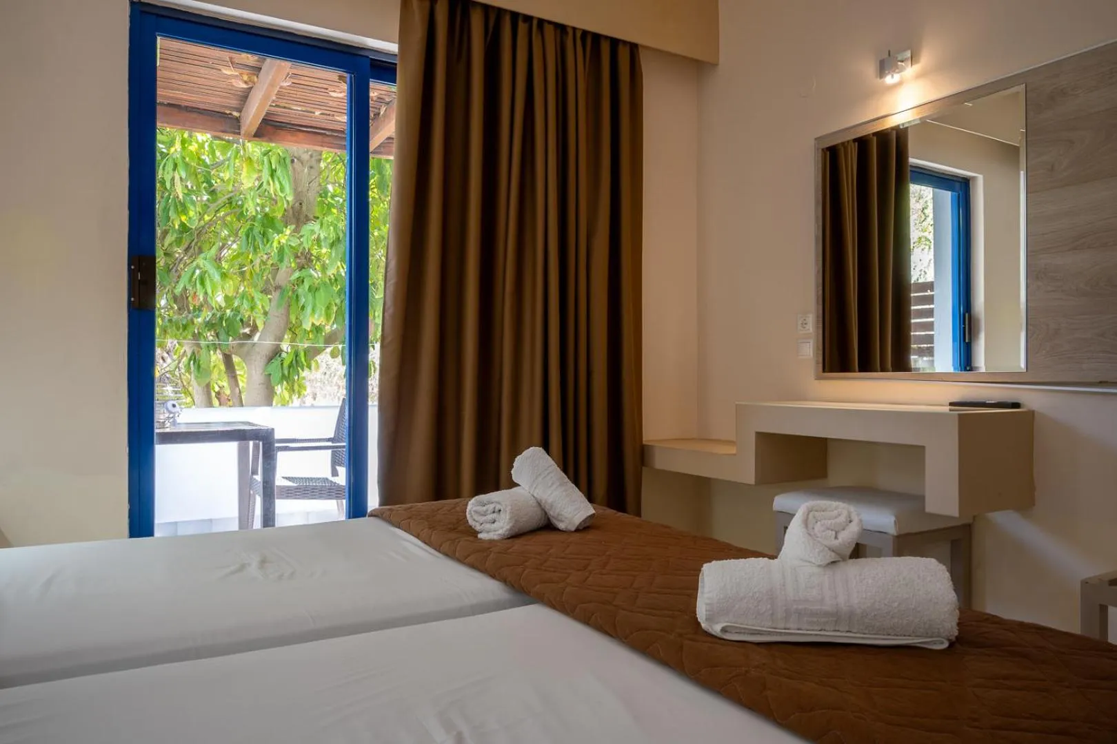 Bed in Triantafillas Suites