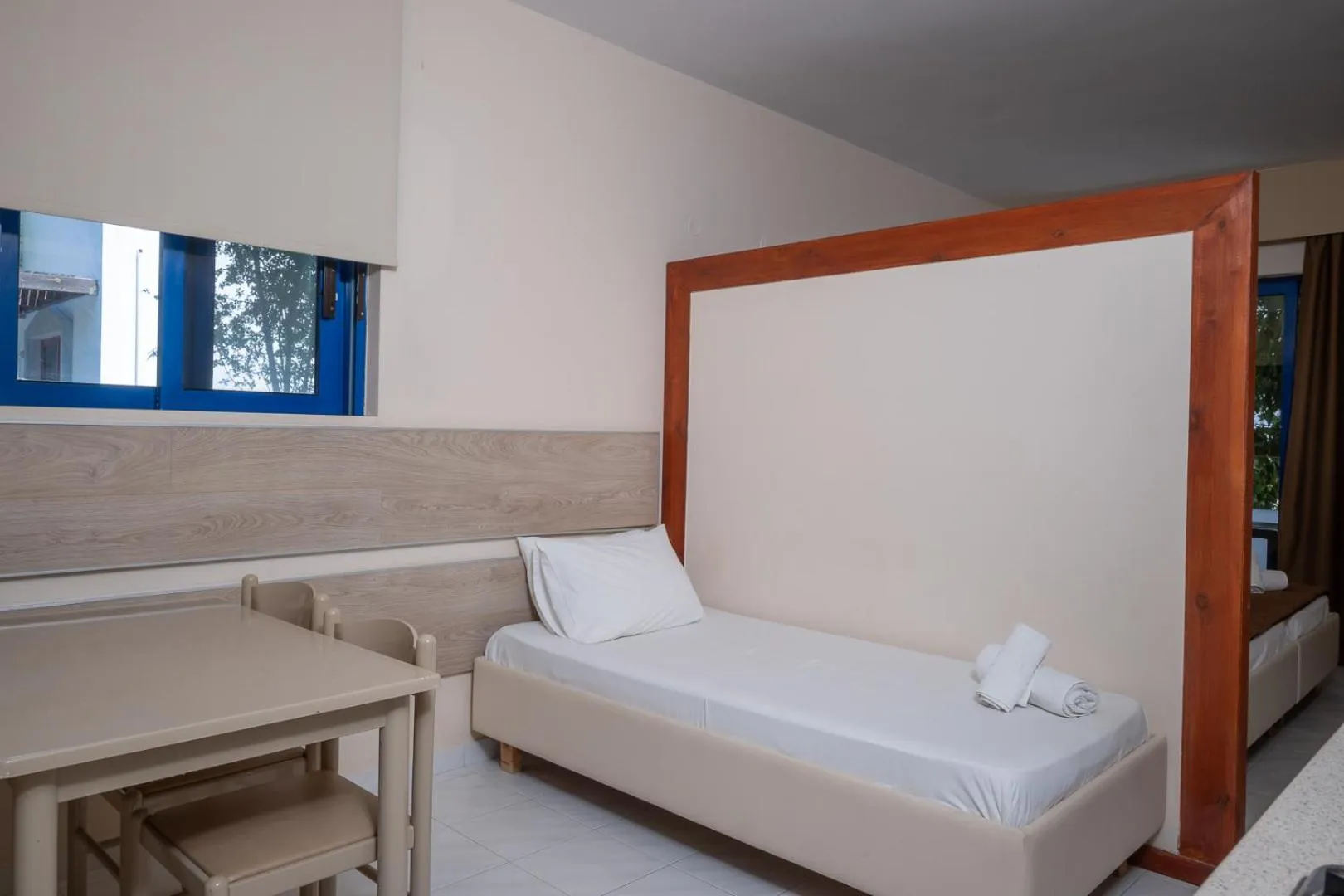 Bed in Triantafillas Suites